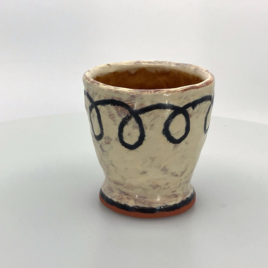 Holly Walker: Cursive cup- black and white, amber interior