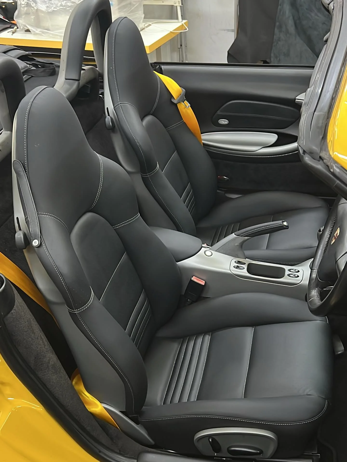 986 Boxster interior refurbished. Seats were retrimmed with the same Porsche Nappa leather with original perforated design. The Center console and various interior plastic parts were also removed and repainted back to its original color. #986 #porsch