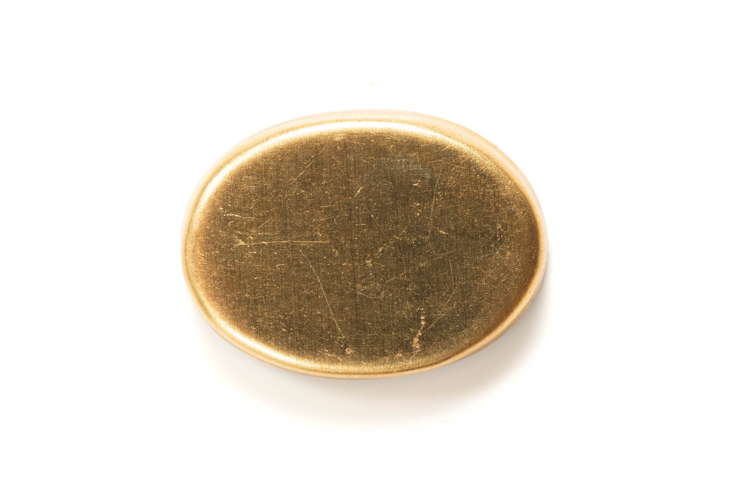 Rear view of the moth micromosaic cabochon, showing its plain oval gold-colored metal base.