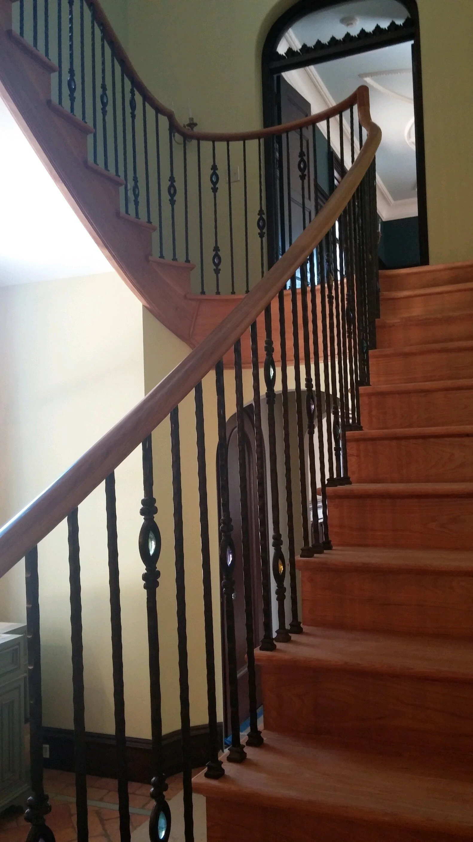 Private home: Staircase railings with polished cast crystal “egg” ornaments. Anna Boothe.