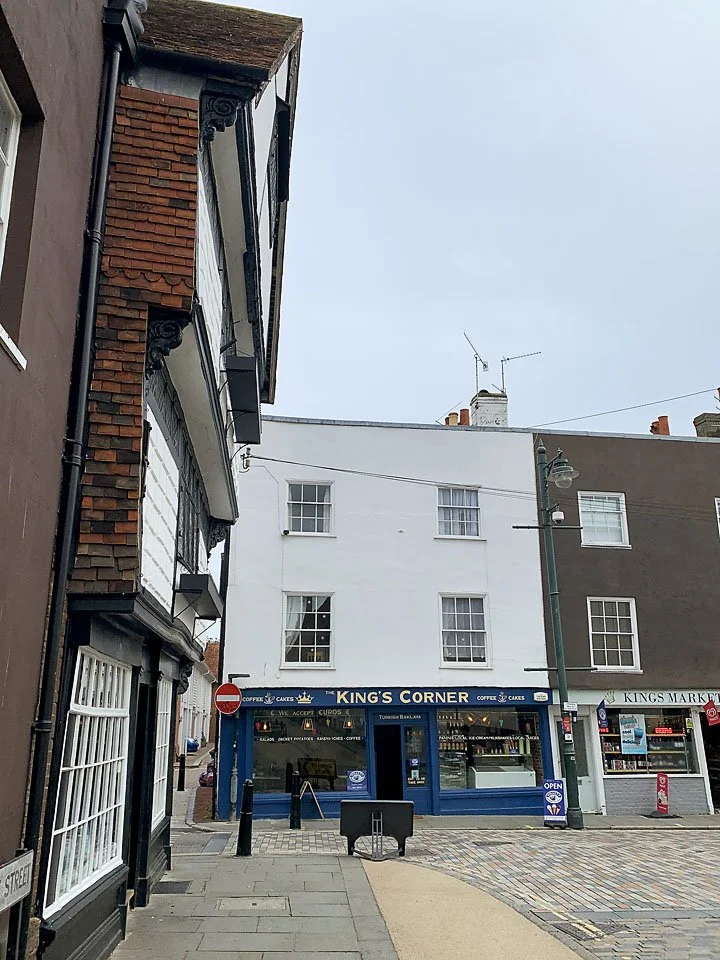 "...I fancied the whole house was leaning forward, trying to see who was passing on the narrow pavement below."