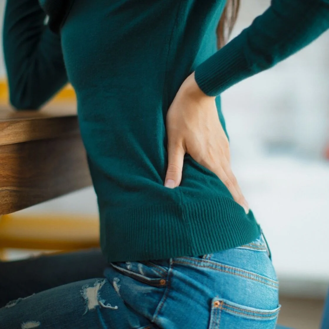Why COVID-19 Can Cause Back Pain, According to Doctors