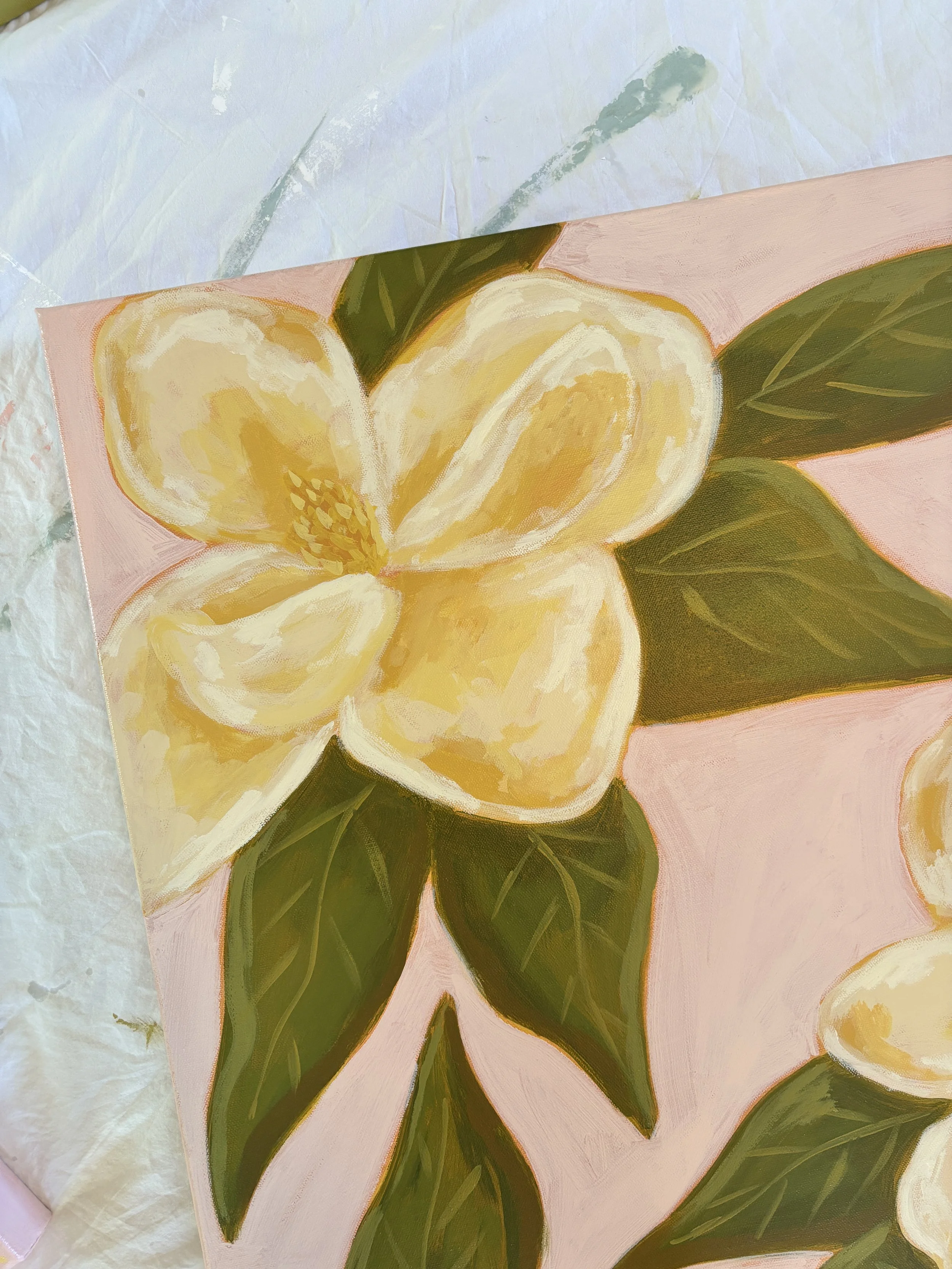 Original acrylic magnolia painting in soft pink, cream, and green tones.