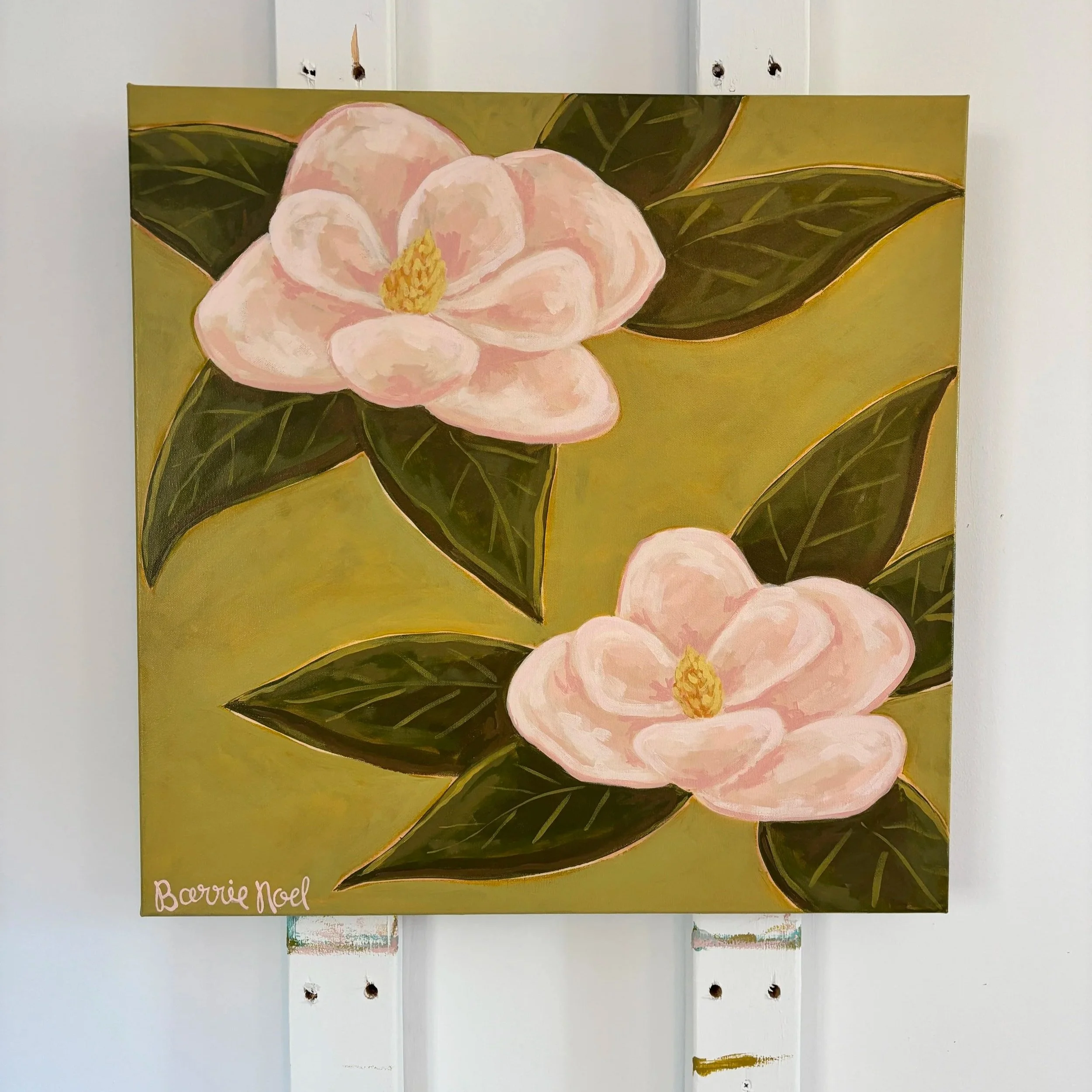Original acrylic magnolia painting with pale pink blooms and soft green leaves on a fresh lime green background.
