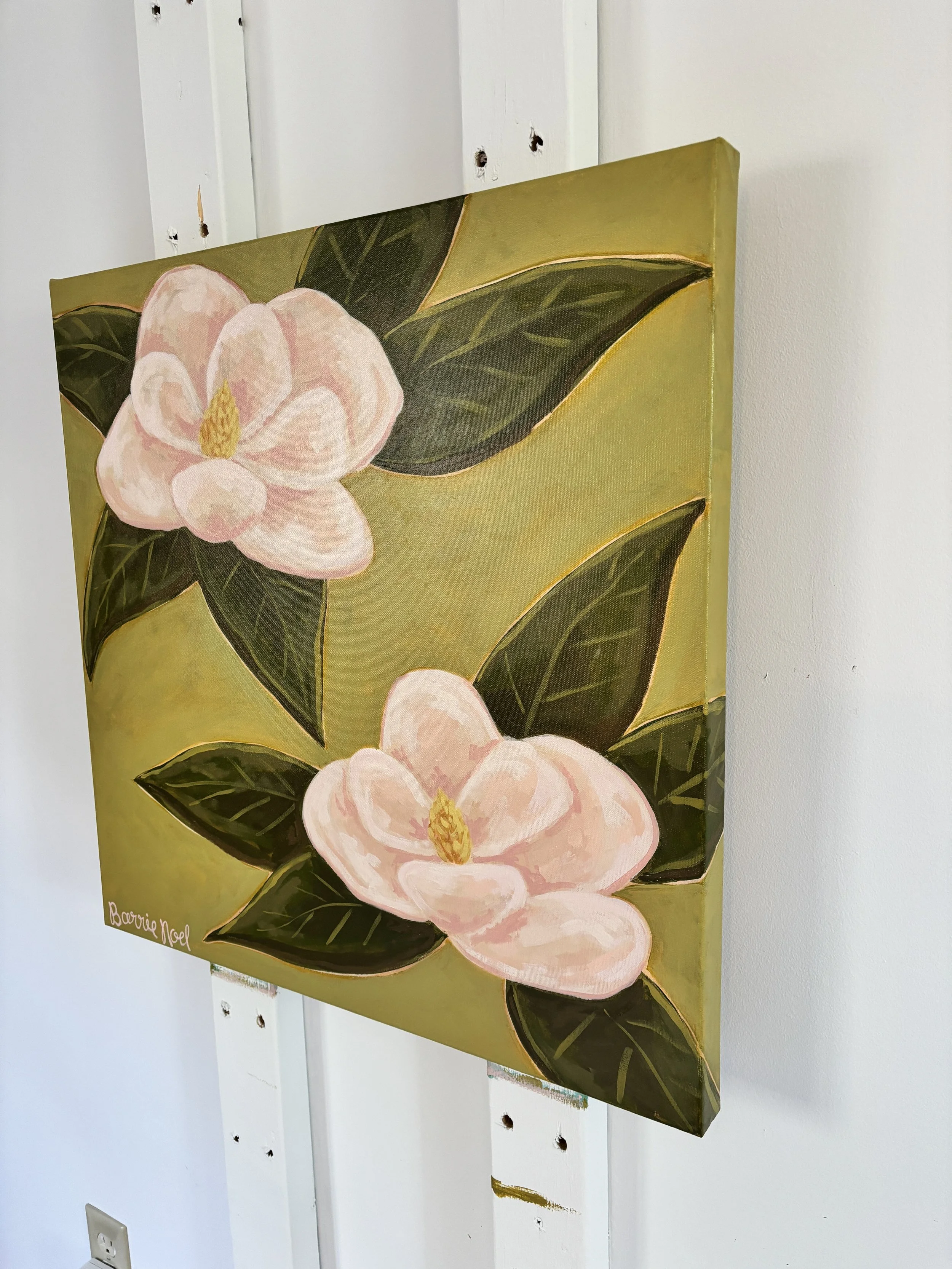 Original acrylic magnolia painting with pale pink blooms and soft green leaves on a fresh lime green background.
