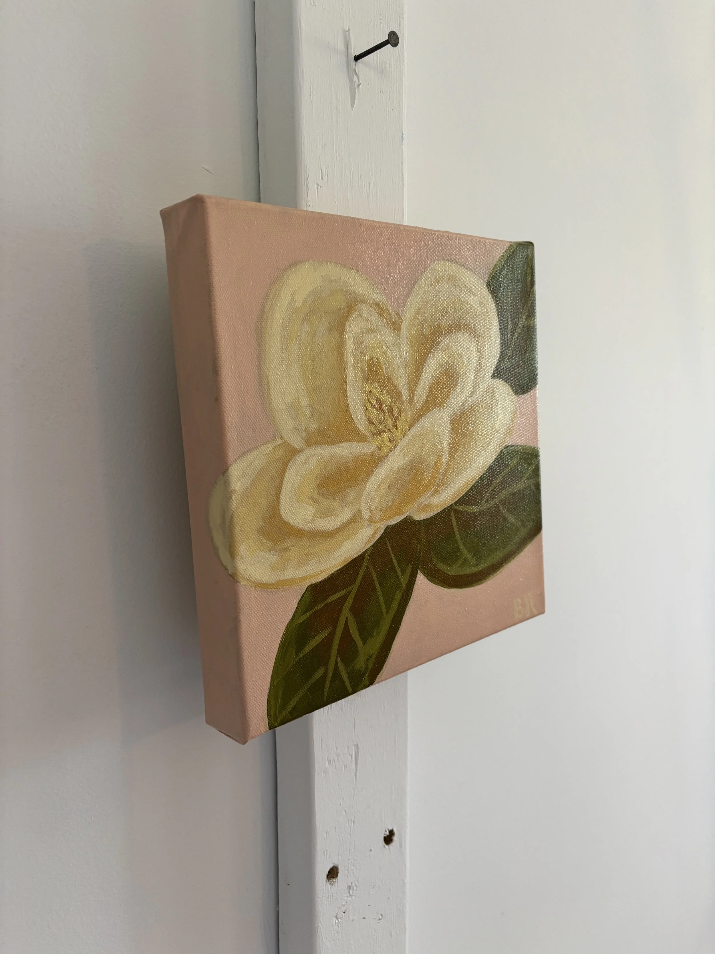 Original acrylic magnolia painting in soft pink, cream, and green tones.