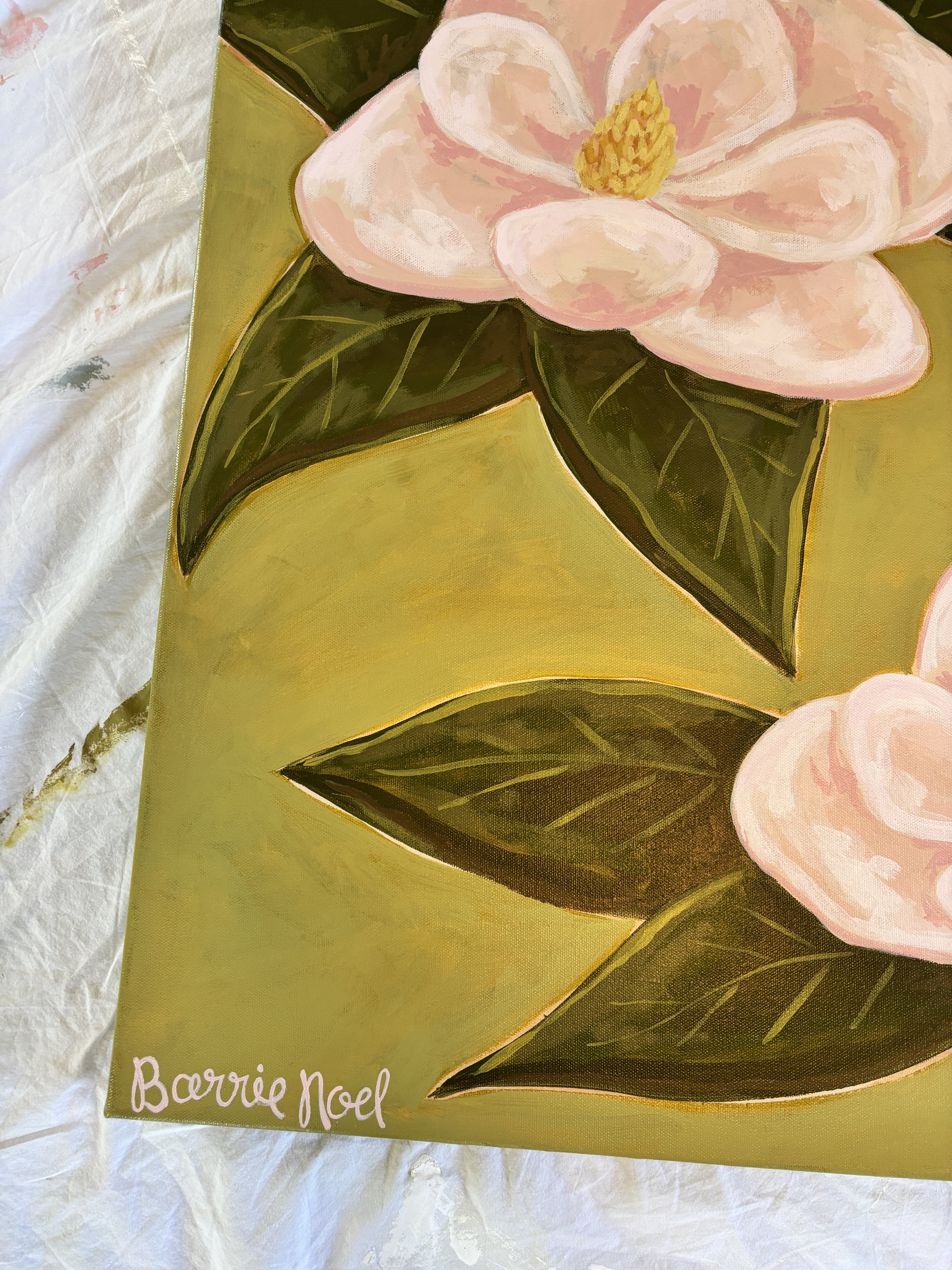 Original acrylic magnolia painting with pale pink blooms and soft green leaves on a fresh lime green background.