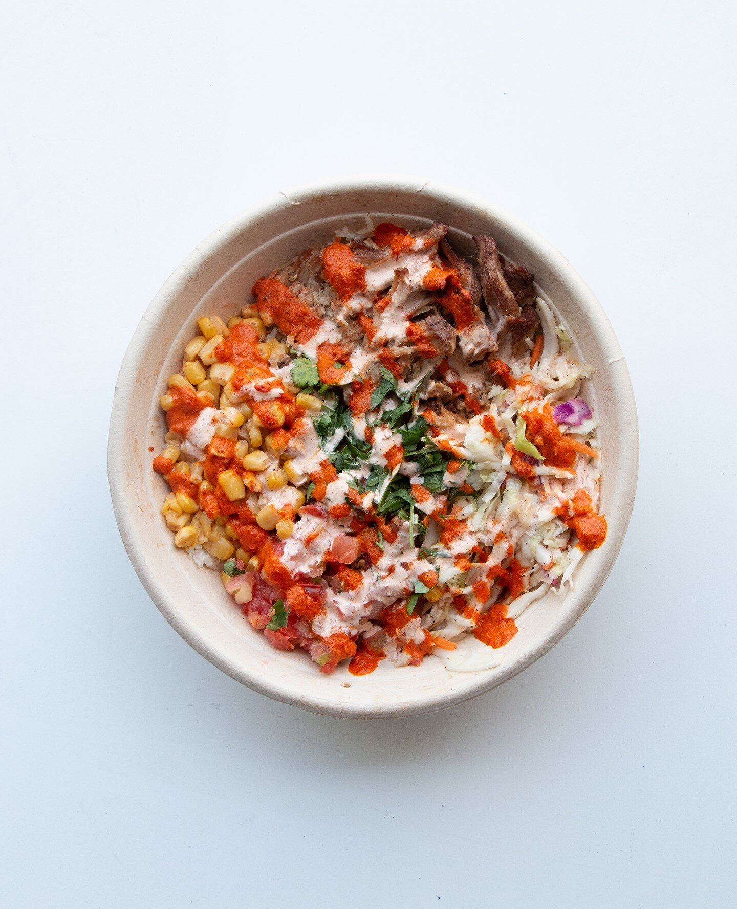 Put a kick in your hump day with our southwest pork bowl--a tasty mix of braised pork, slaw, pico de gallo, corn, fresh cilantro, &amp; lime crema 🌵⁠
⁠
💚 Order Heritage Eats for delivery or pick up!  Go to www.heritageeats.com and hit 'Order Online