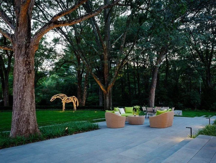 When evening falls, your landscape doesn’t disappear—it transforms. Subtle lighting reveals textures, highlights sculptural plants and artwork, and guides the way along steps and paths for safety and ease in the evening.
Eric Roth Ph