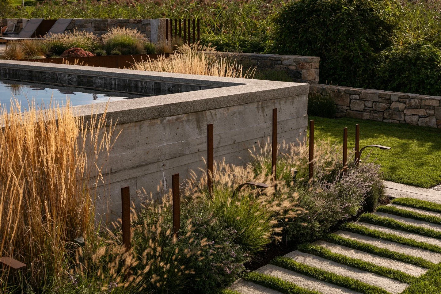 A fun fact about this Rhode Island home: the Corten posts surrounding the pool are arranged in the pattern of musical notes to the client's favorite song, "Good Day Sunshine". ⁠
⁠
As we reflect on 2025, we want to again congratulate our ded