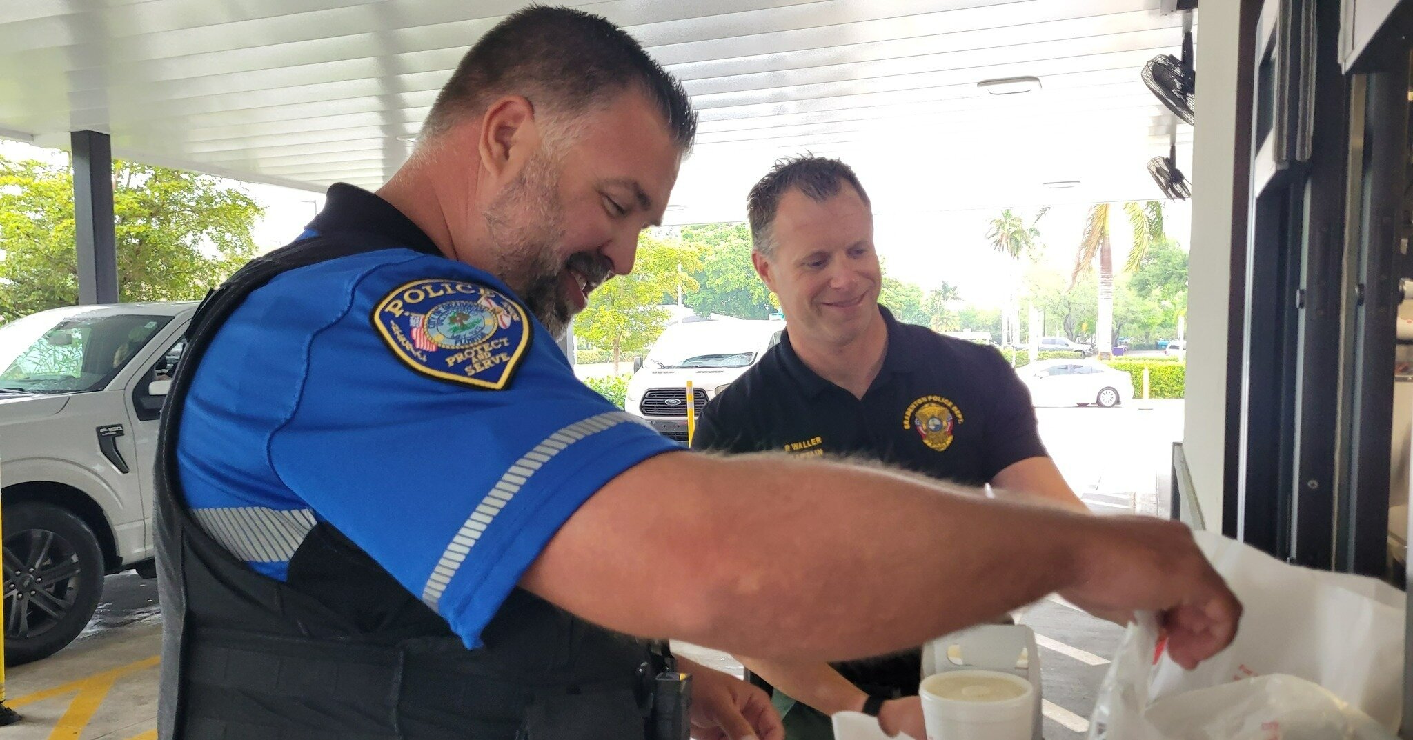 BPD's second Chick-fil-A Protect and Serve event at @chickfila_manateeave was a success - and we're getting pretty good at helping out in the drive-thru lanes if we do say so ourselves! It's fun to surprise patrons and say hello while helping serve t