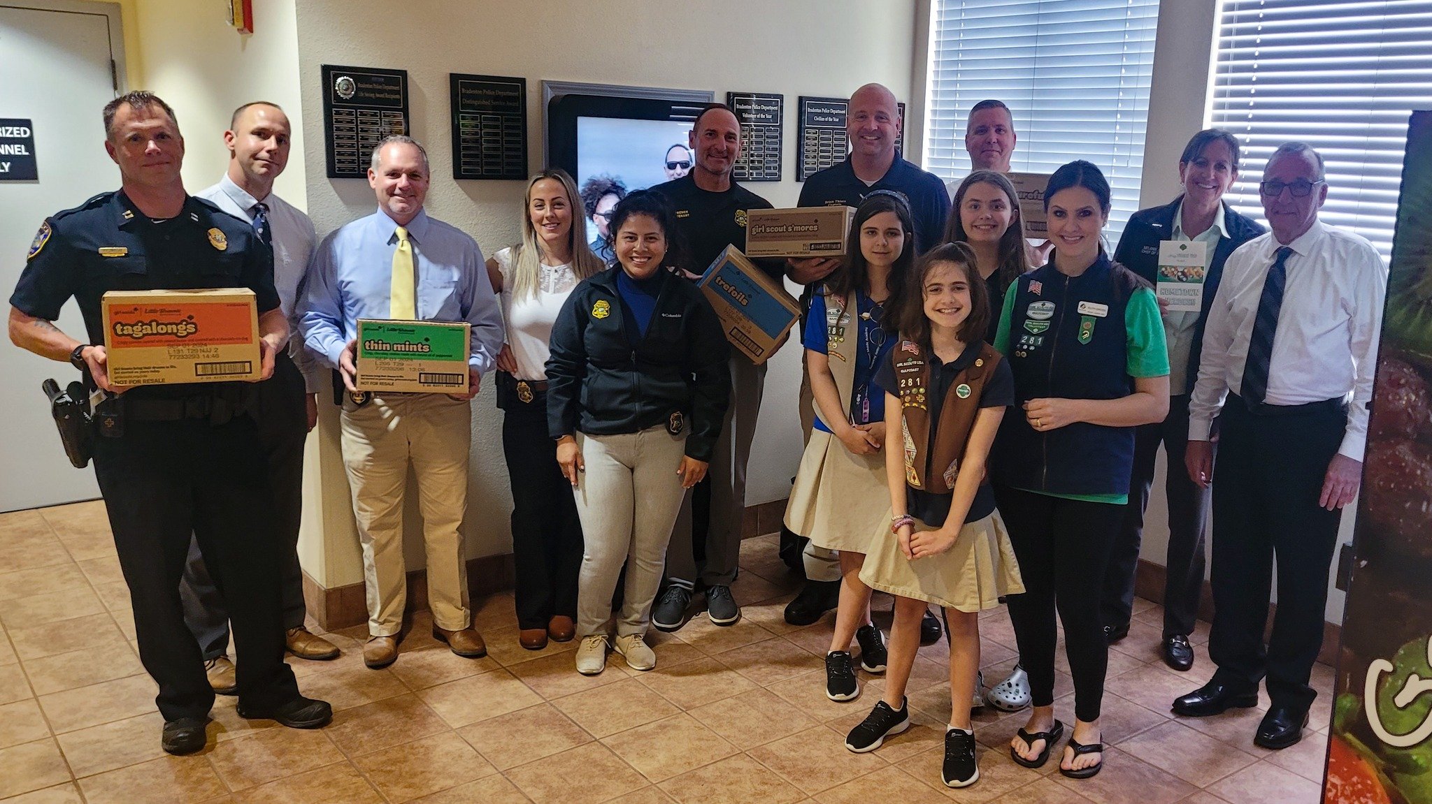 🍪 THANK YOU, Girl Scout Troop 281, for stopping by with some of our favorite cookies! According to our unscientific poll of available officers, Tagalongs are a popular choice. But you can never go wrong with Thin Mints!