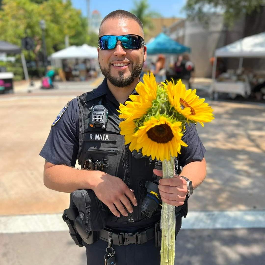 This pic of Officer Mata from last week's @bradentonmarket is everything! Yes, the market is open tomorrow during its normal hours, 9 a.m.-2 p.m. Please note that road closures for the De Soto Grand Parade begin at 1 p.m. (for parade staging) and the