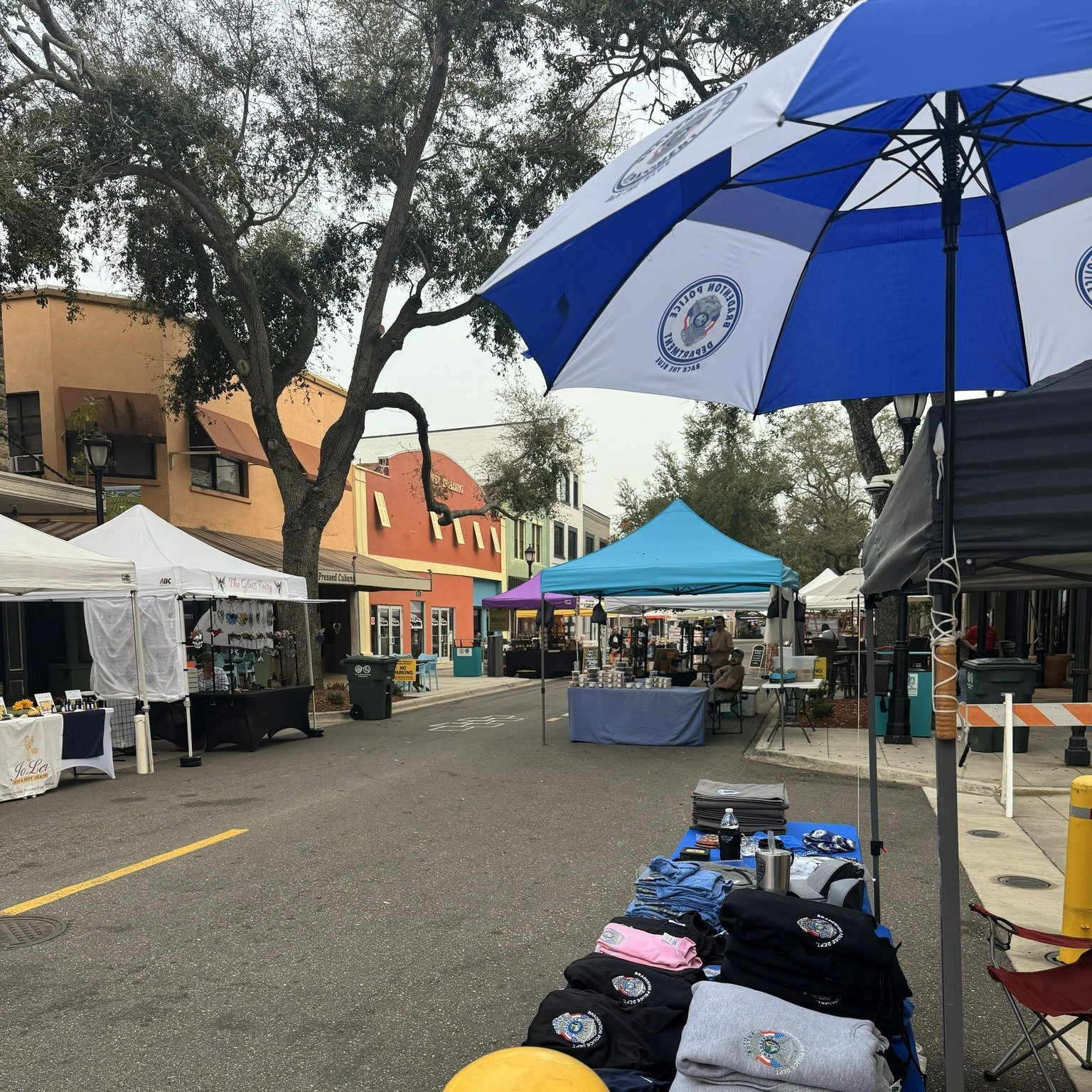 🚔 Come see us at the @bradentonpublicmarket! We're selling BPD swag - including challenge coins, t-shirts, hats, and even umbrellas! 
💲 We're a CASH-ONLY booth, and all proceeds benefit our Explorers and other outreach initiatives. 
🛍️ The market 