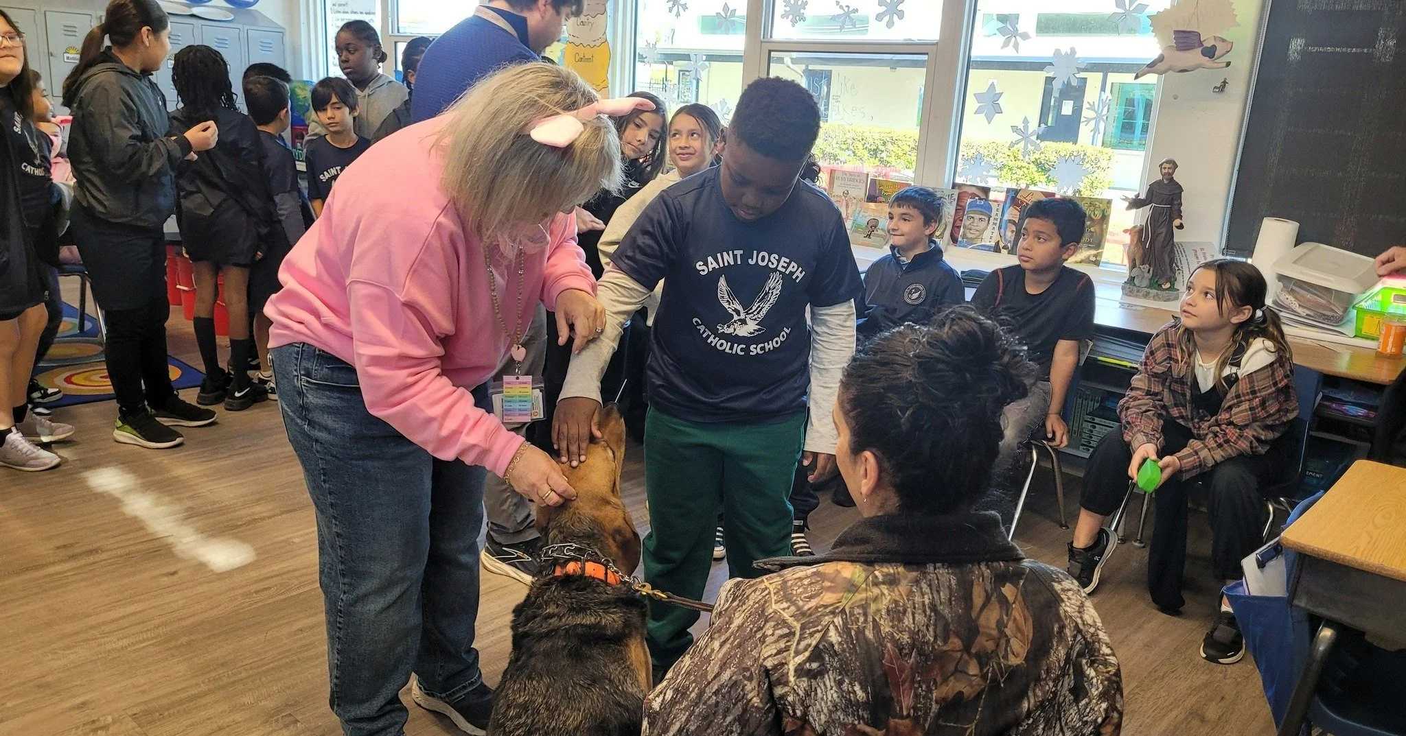 Thank you to St. Joseph Catholic School for inviting Chief Josh Cramer, Detective Lixa Moyett, and K9 Liberty to visit! After enjoying a book together, these third graders asked some great questions about what it's like to be the Chief of Police (a l