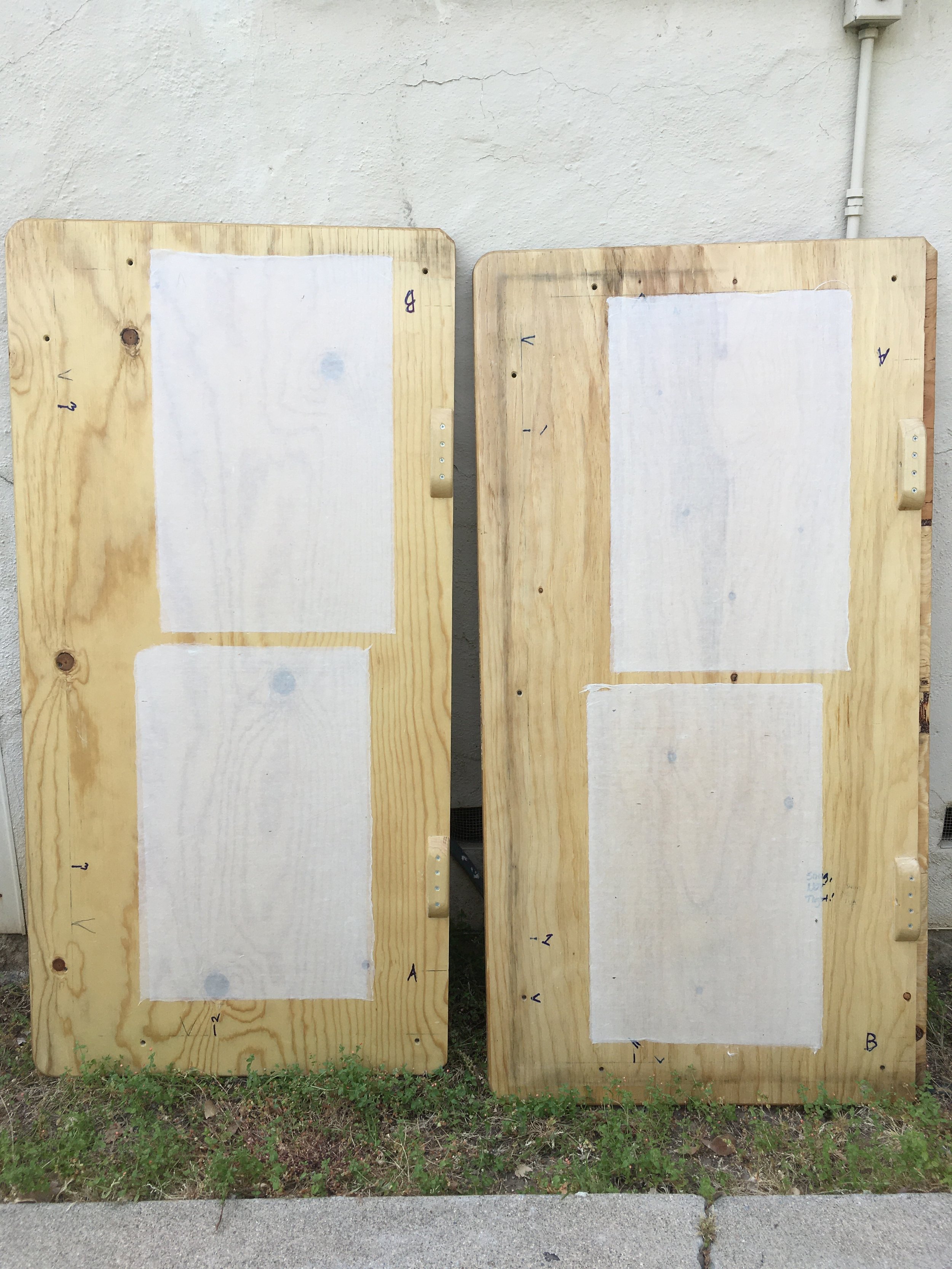 sheets drying on boards.JPG
