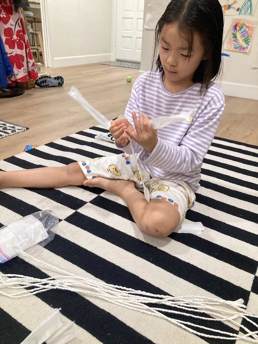 winnie making hanji cord 2.JPG