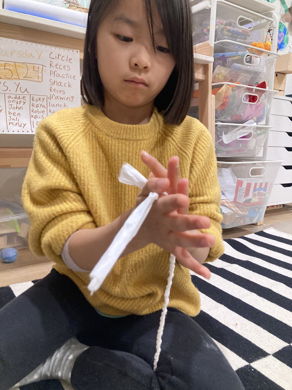 winnie making hanji cord.JPG