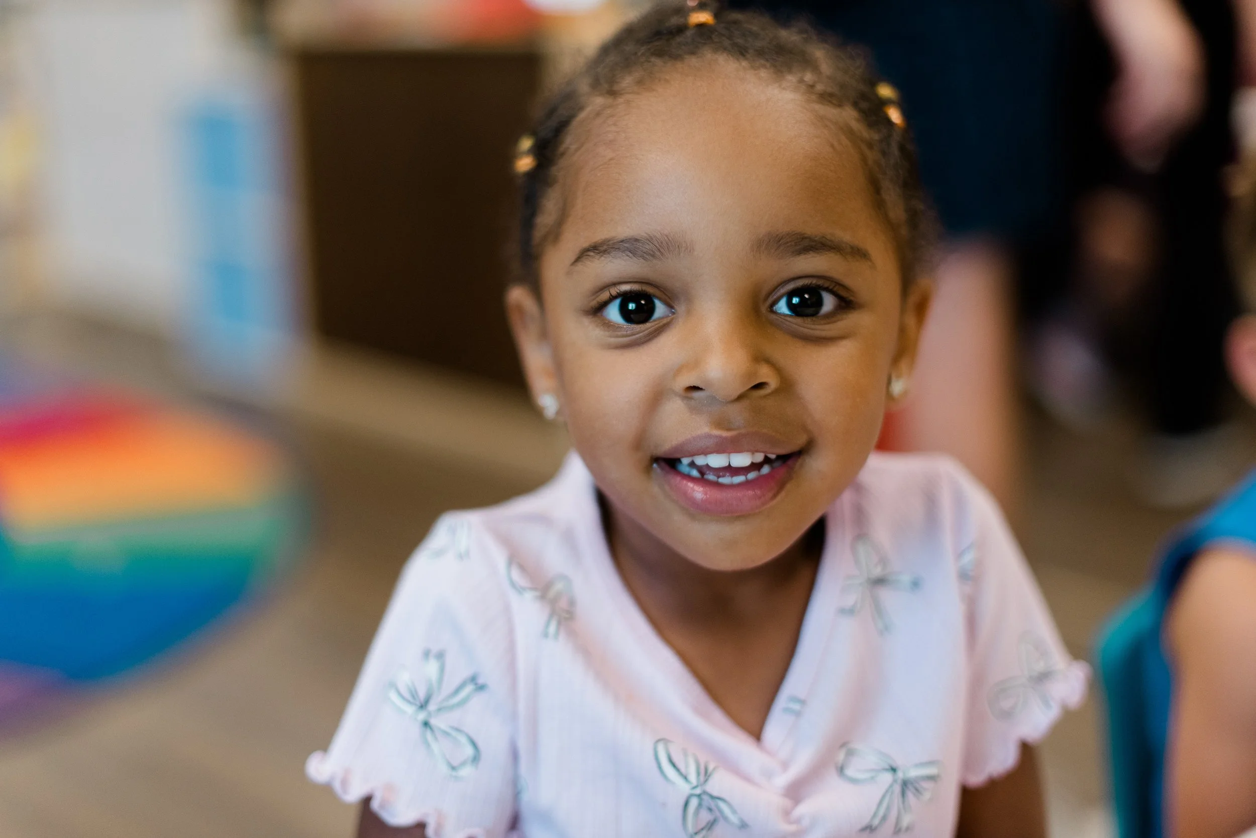 Young girl smiling at the camera