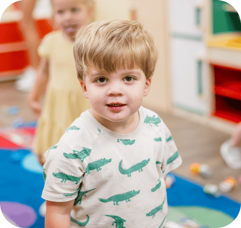 Penguin room kid smiling in daycare