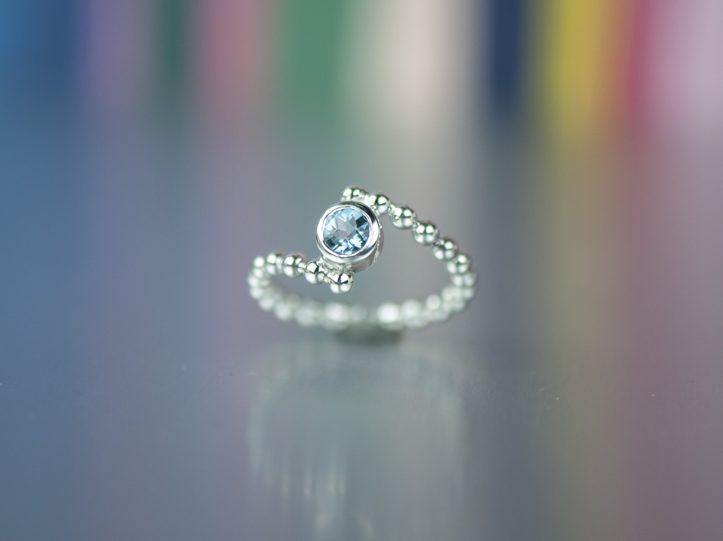 blue topaz bypass ring 2.jpg