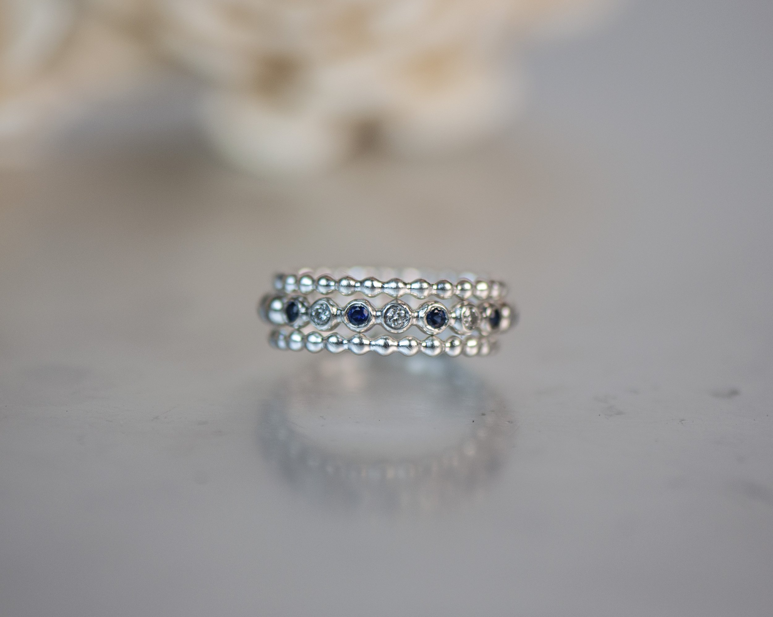 saph and dia bubble ring with 2mm bands 2.jpg