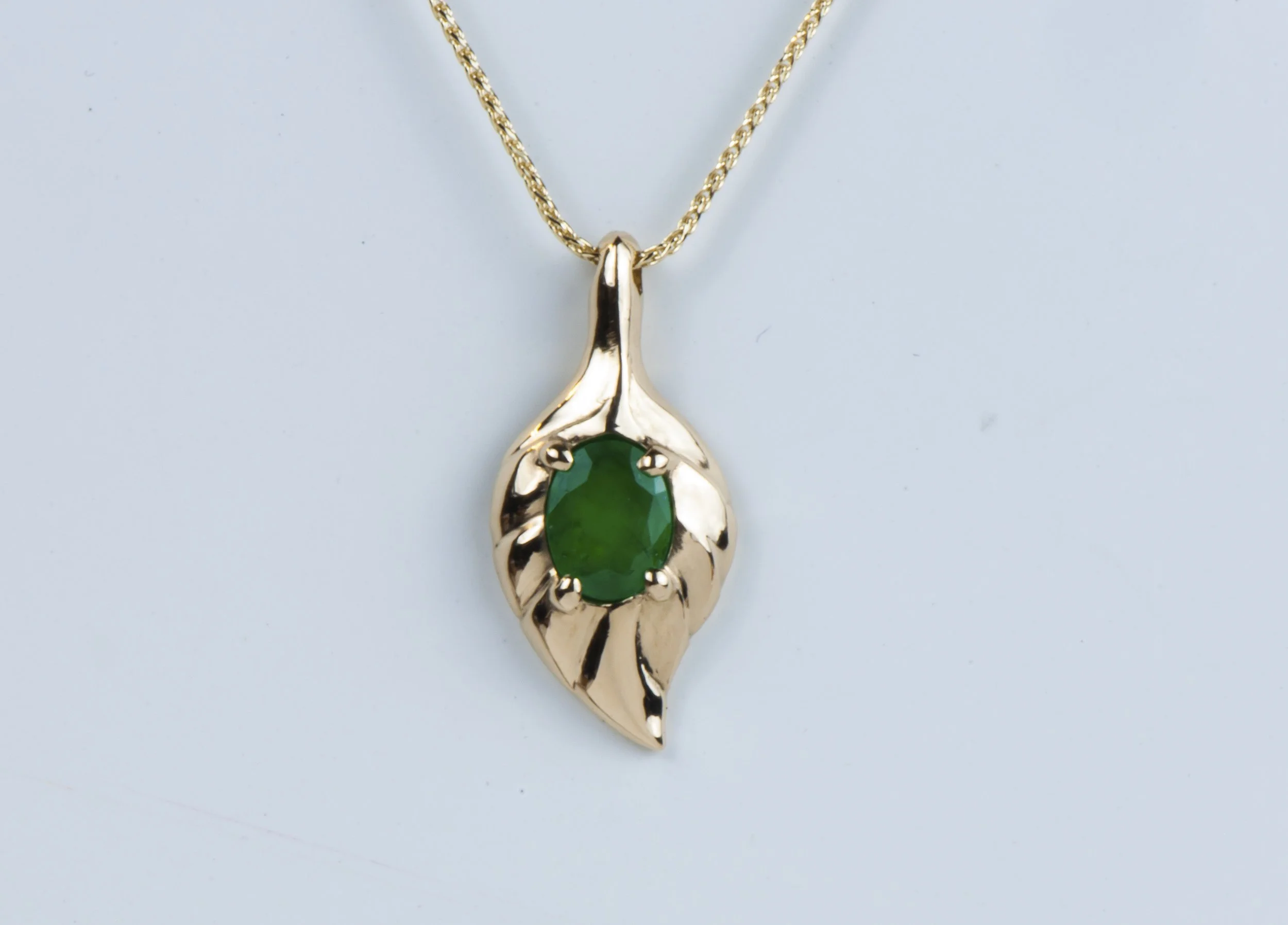 Hand Carved Leaf Pendant with Emerald