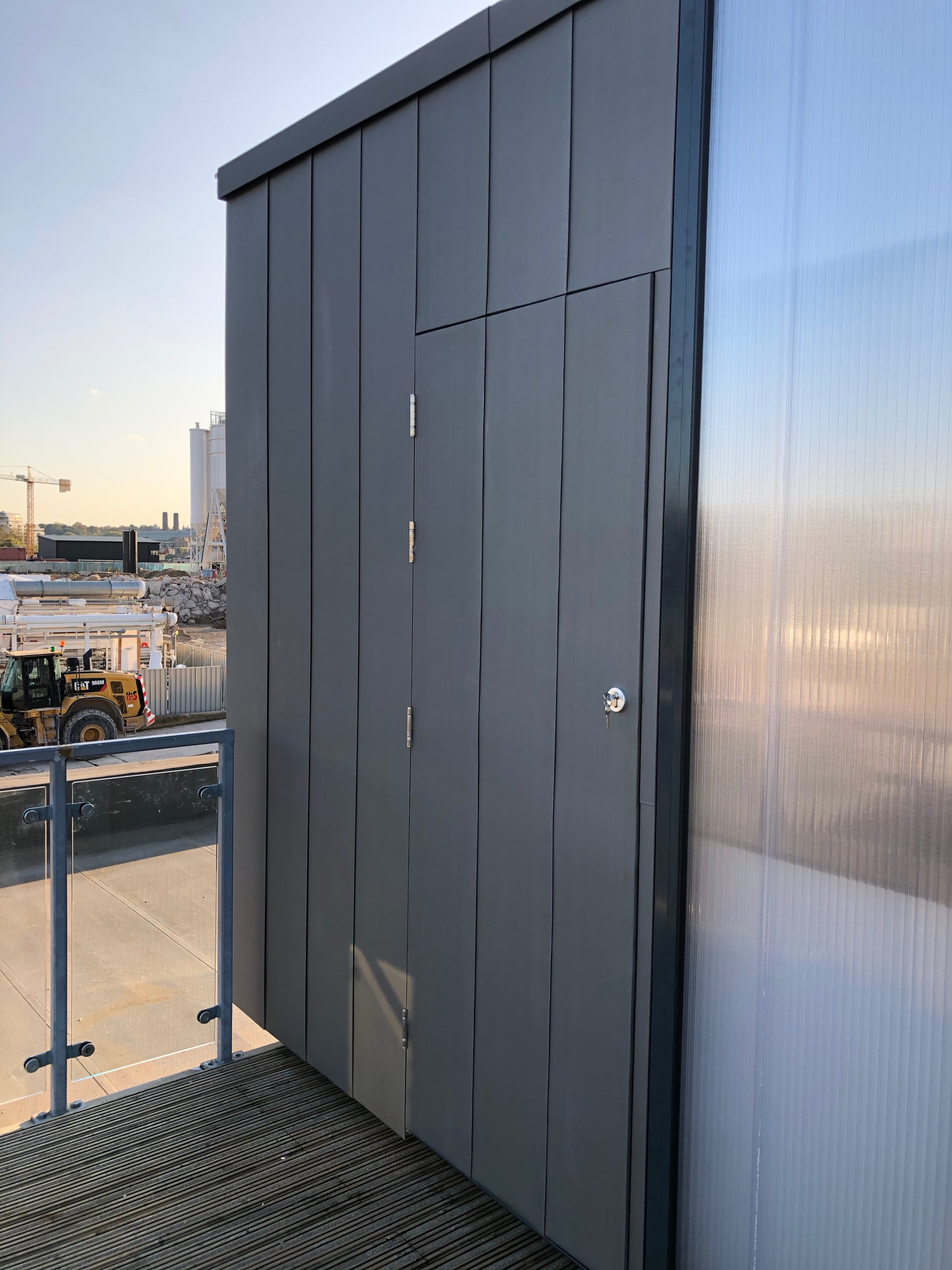 flat seam zinc cladding including door opening
