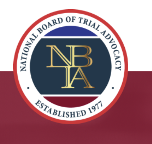 Logo of the National Board of Trial Advocacy with a red, white, and blue circular design and gold initials NBTA in the center