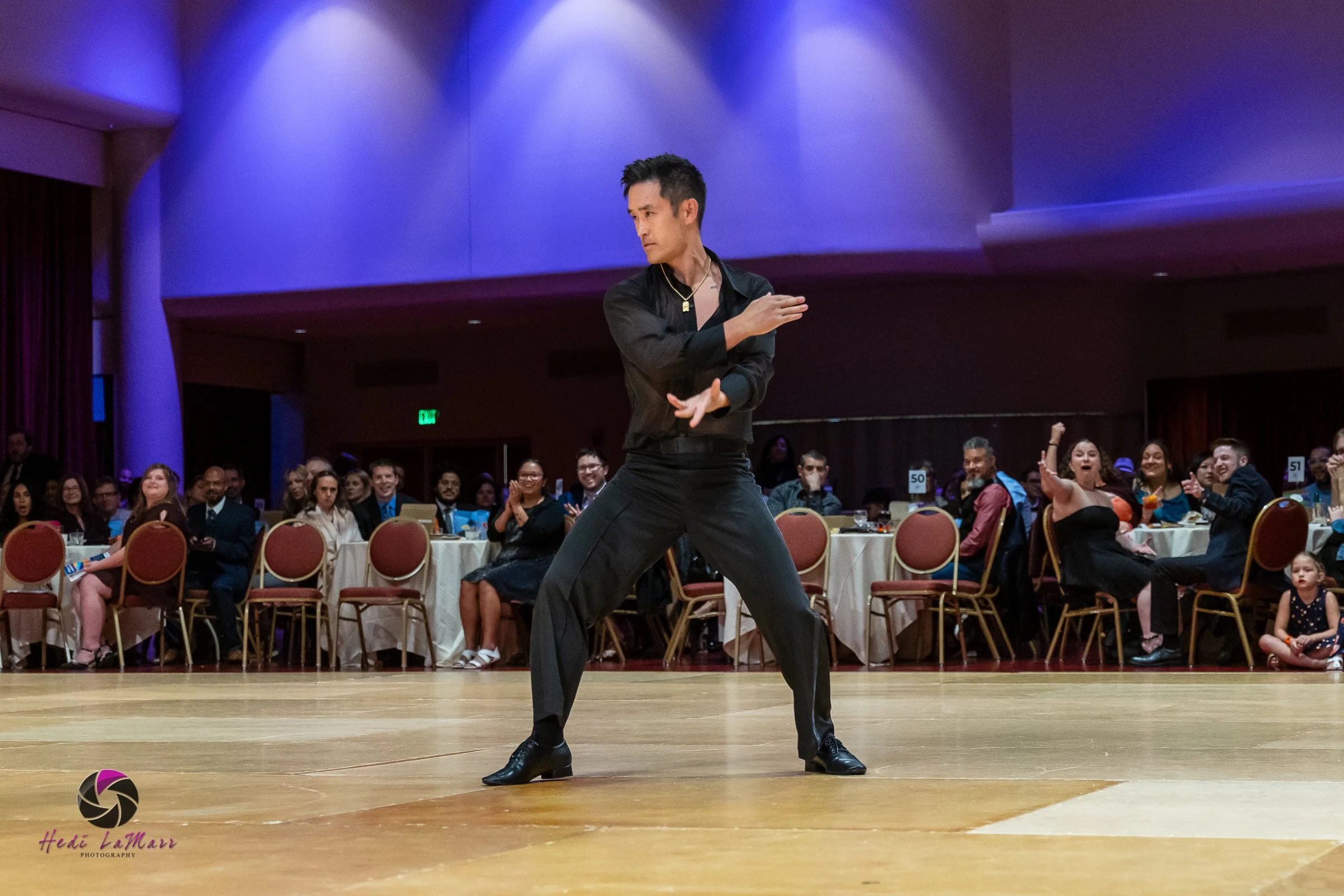 Mike Moh, 2026 Celebrity Dance Contestant and winner, shows off his signature moves on the Rhumba 4 Rainbow dance floor at the 22nd annual gala