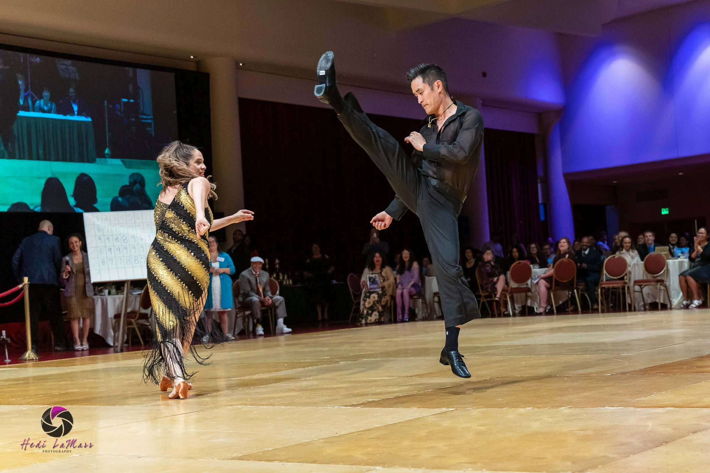 Mike Moh, 2026 Celebrity Dance Contestant and dance partner Jimena Irvis, show off his signature moves on the Rhumba 4 Rainbow dance floor at the 22nd annual gala