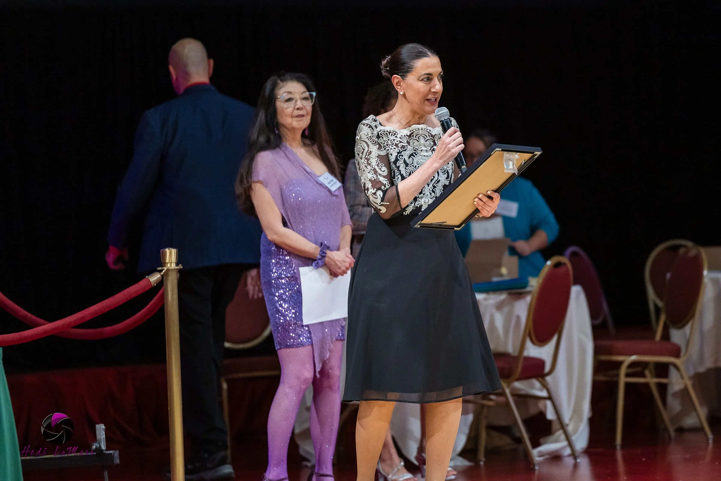 Shiva Bidar-Sielaff, Associate Dean for Social Impact and Belonging at UW School of Medicine and Public Health presenting a 2026 Extra Mile Award