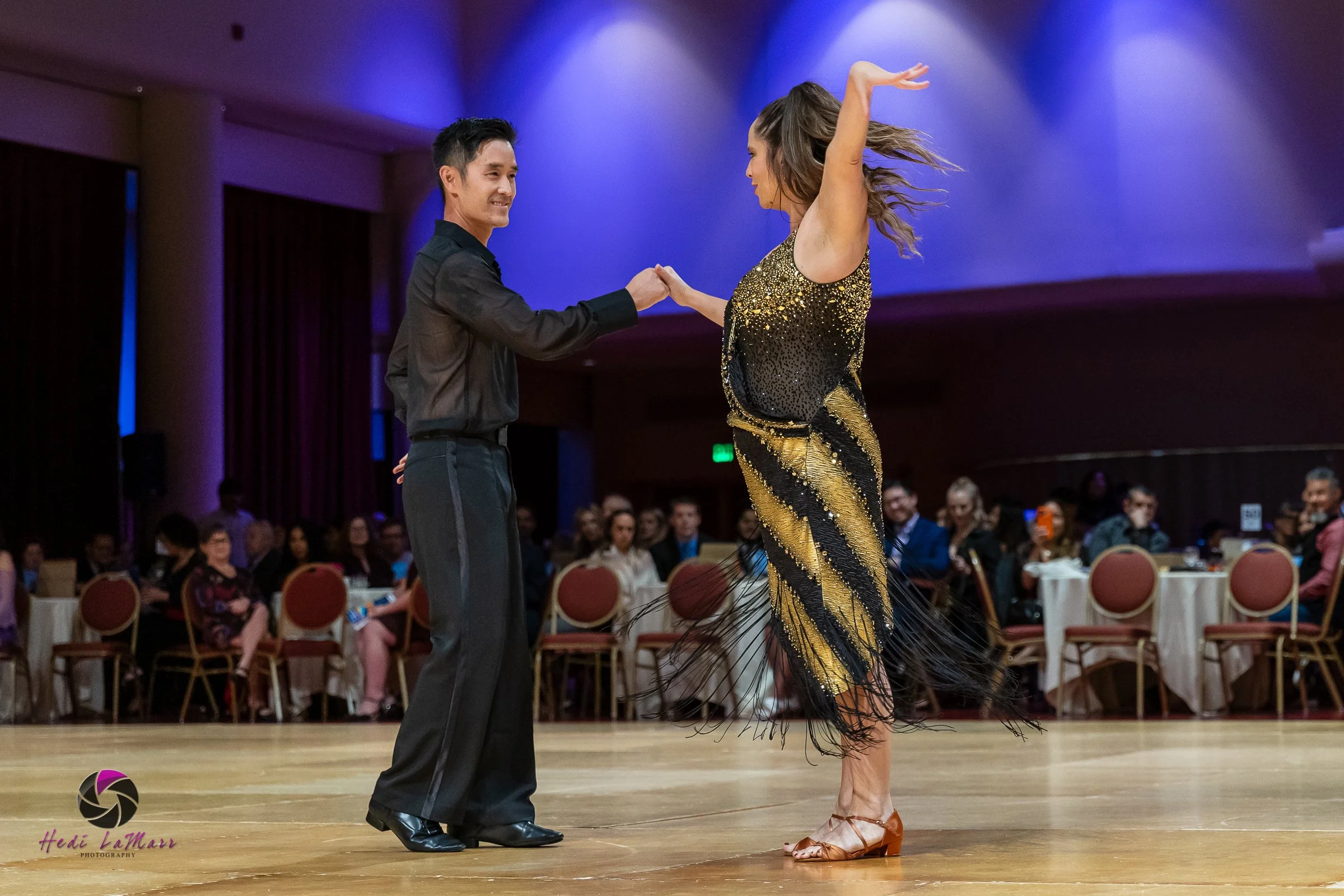 Mike Moh, 2026 Celebrity Dance Contestant, and dance partner, Jimena Irvis from Arthur Murray Dance Studio take to the dance floor