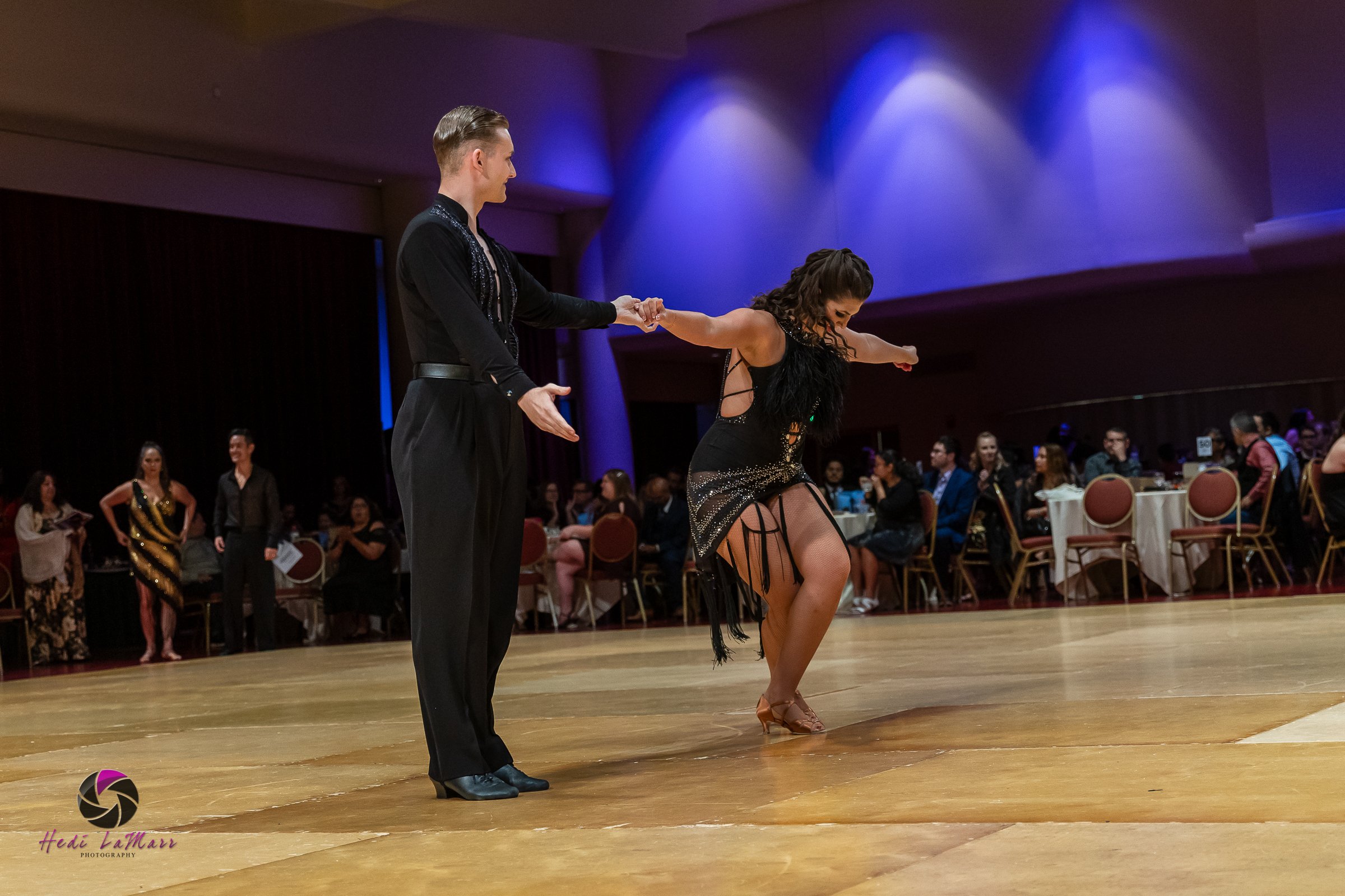 Alaina Tomesh, 2026 celebrity dance contestant at the 22nd annual Rhumba 4 Rainbow Gala, and dance partner Nikita Grygorchuk from Fred Astaire Dance Studio, final bow