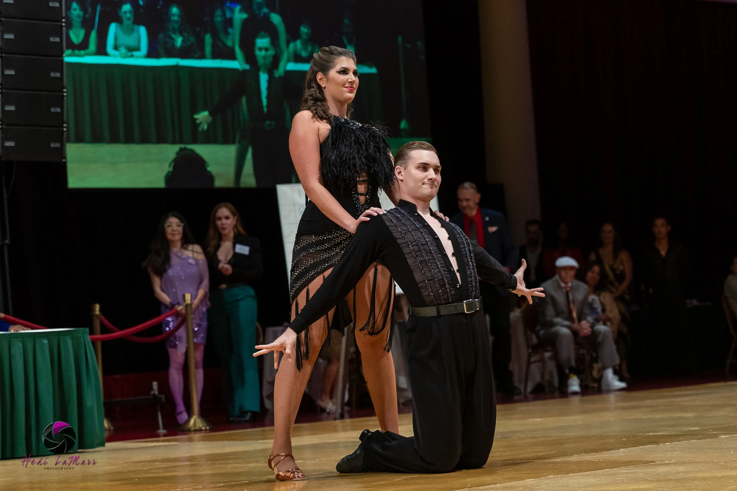 Alaina Tomesh, 2026 celebrity dance contestant at the 22nd annual Rhumba 4 Rainbow Gala, and dance partner Nikita Grygorchuk from Fred Astaire Dance Studio, take to the dance floor