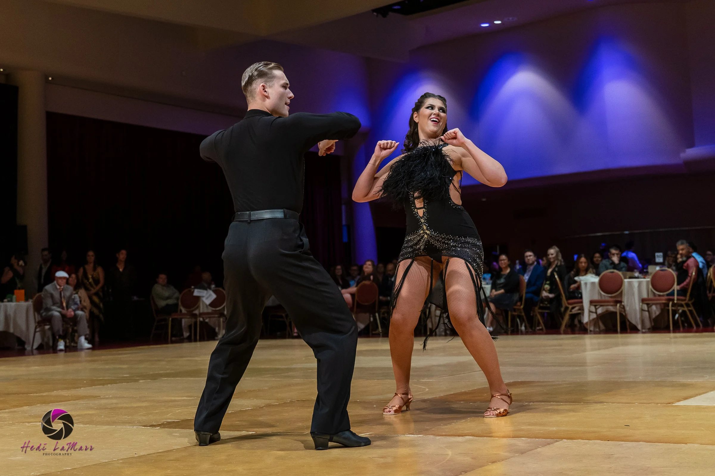 Alaina Tomesh, 2026 celebrity dance contestant at the 22nd annual Rhumba 4 Rainbow Gala, and dance partner Nikita Grygorchuk from Fred Astaire Dance Studio, take to the dance floor