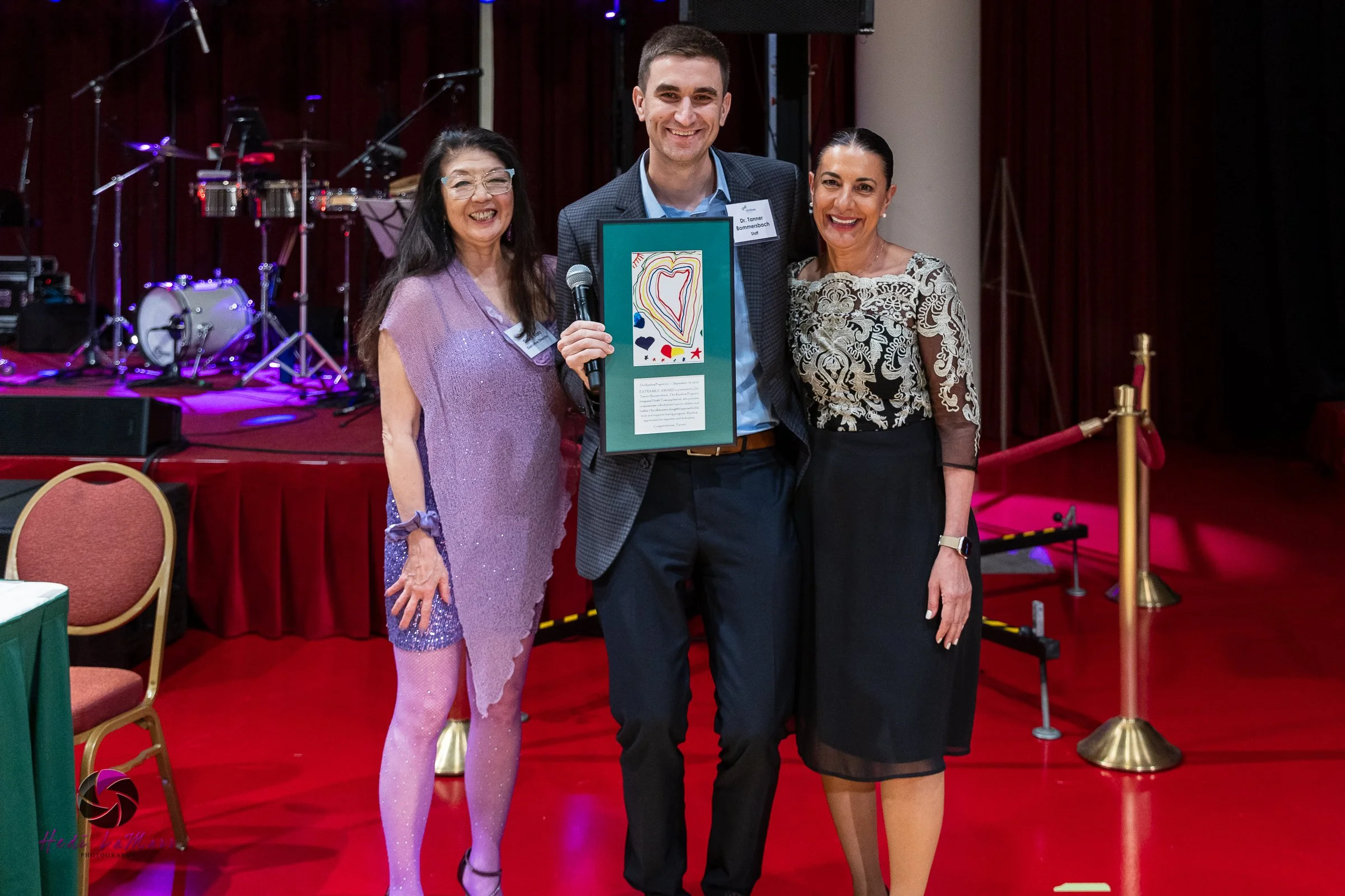 Dr. Tanner Bommersbach, 2026 Extra Mile Award Winner, pictured with Sharyl Kato (left), Founder and Executive Director of The Rainbow Project, and Shiva Bidar-Sielaff, Associate Dean for Social Impact and Belonging at UW School of Medicine and Public