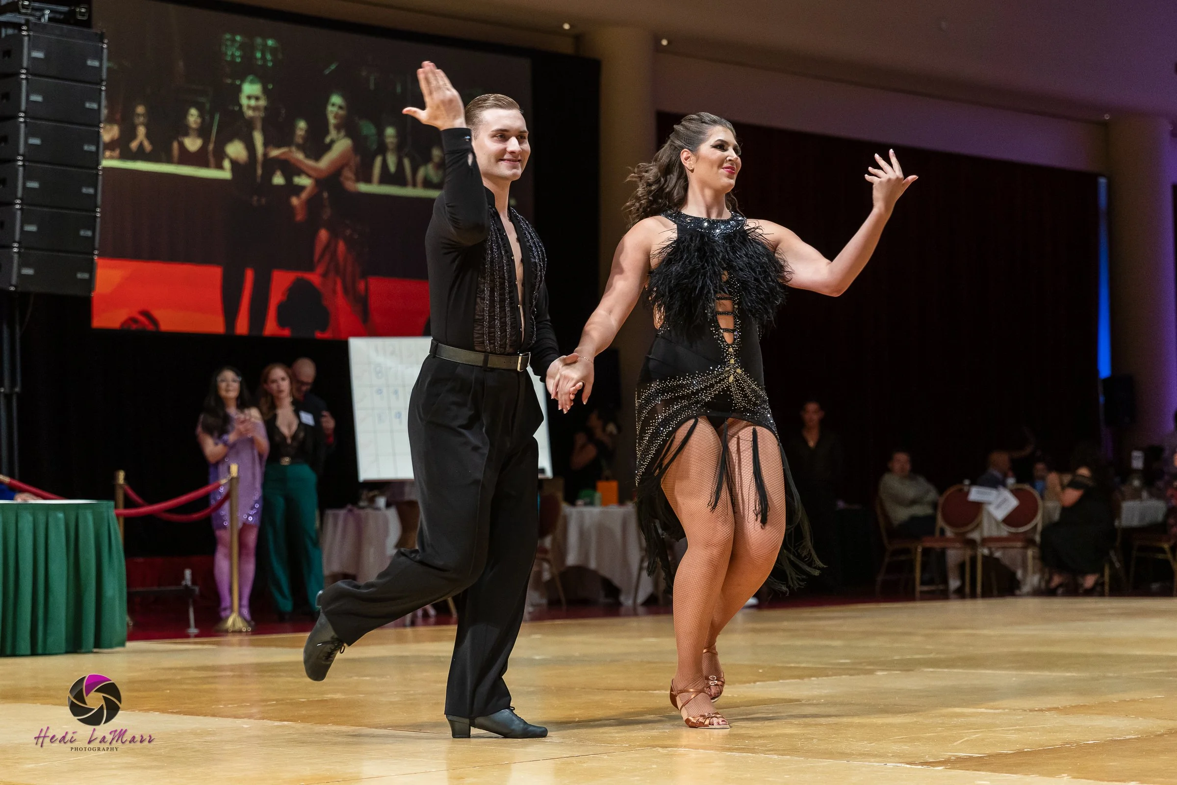 Alaina Tomesh, 2026 celebrity dance contestant at the 22nd annual Rhumba 4 Rainbow Gala, and dance partner Nikita Grygorchuk from Fred Astaire Dance Studio, take to the dance floor