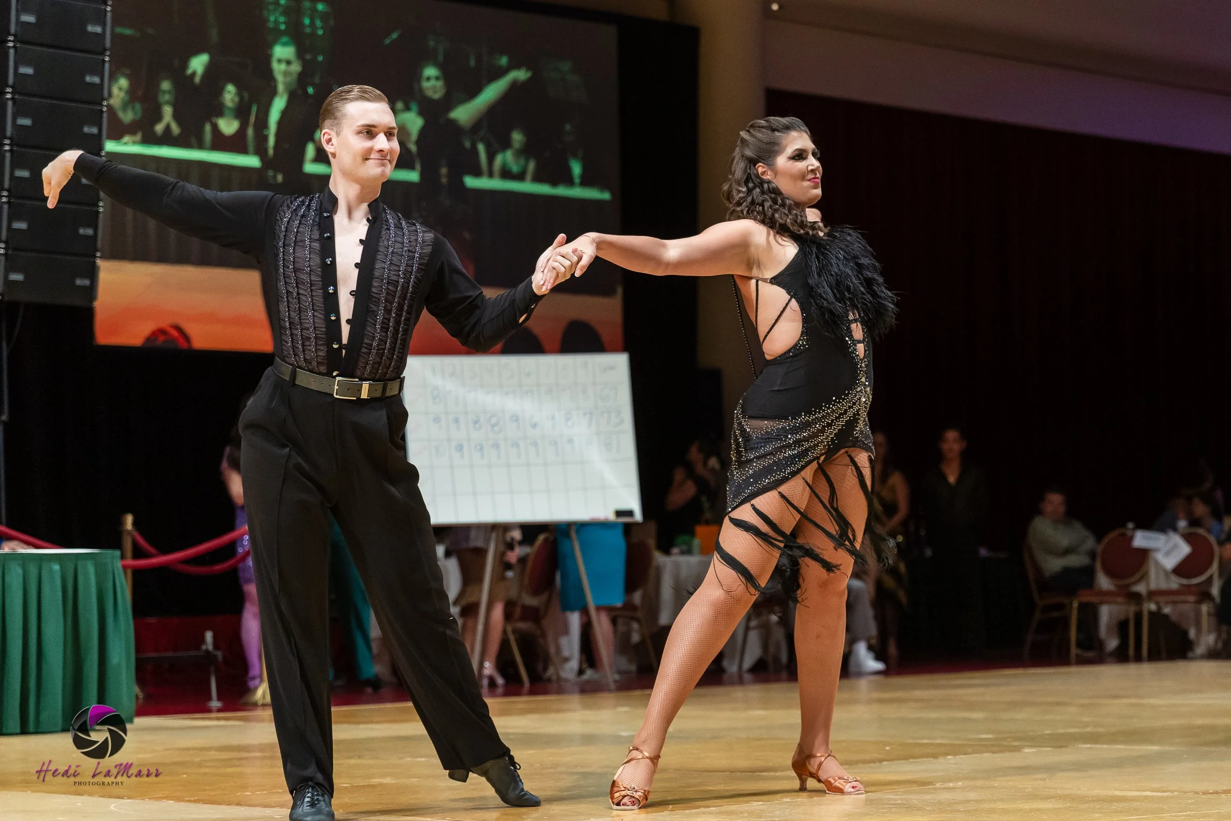 Alaina Tomesh, 2026 celebrity dance contestant at the 22nd annual Rhumba 4 Rainbow Gala, and dance partner Nikita Grygorchuk from Fred Astaire Dance Studio, take to the dance floor