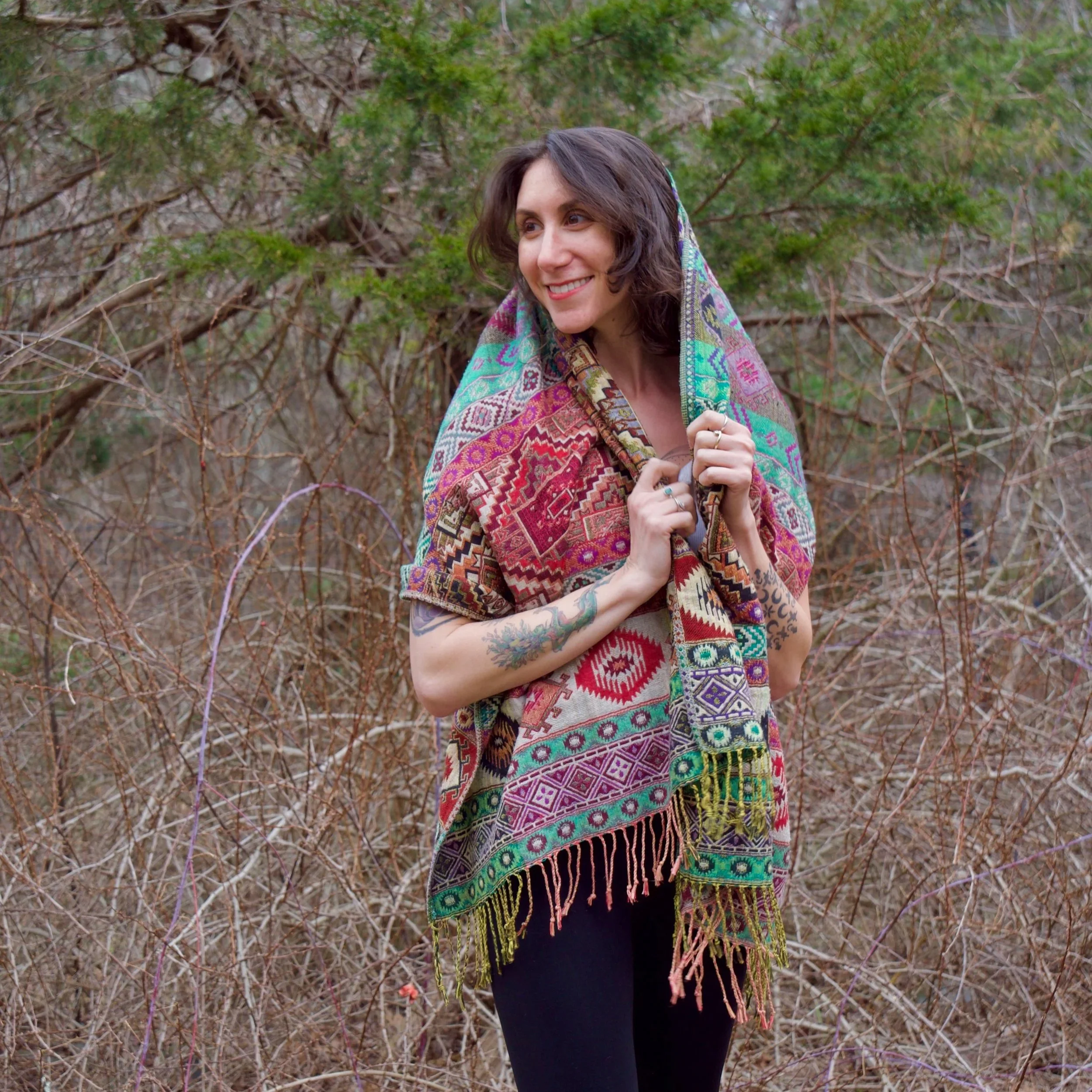 Ronni Clara Rose, psychotherapist, smiling outdoors