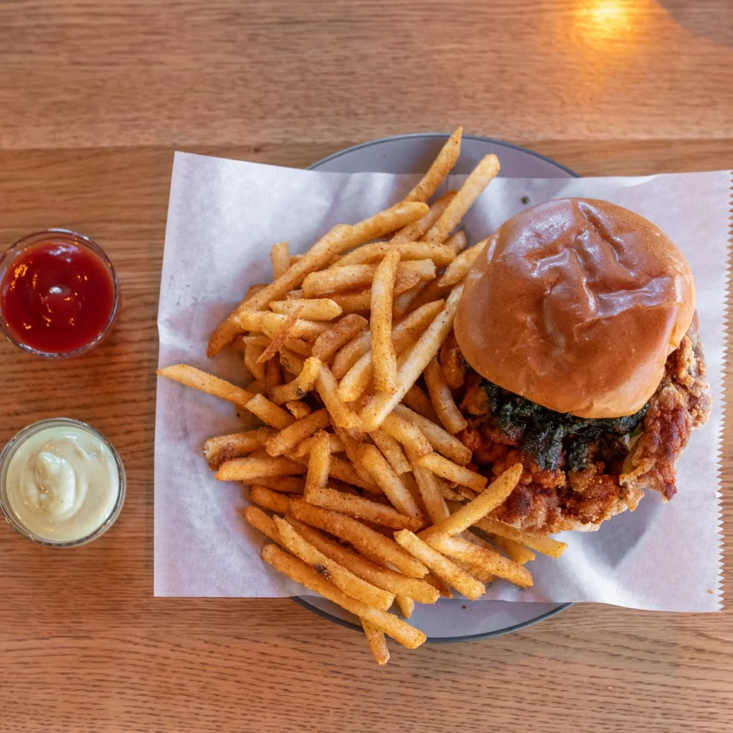 Did you know L2 has a chicken sandwich??? It&rsquo;s delicious, with our house-made Taiwanese pickles, Thai chili aioli, and a Thai basil chimichurri ❤️ Pair it with your favorite L2 cocktail for the best little treat you can imagine 😋