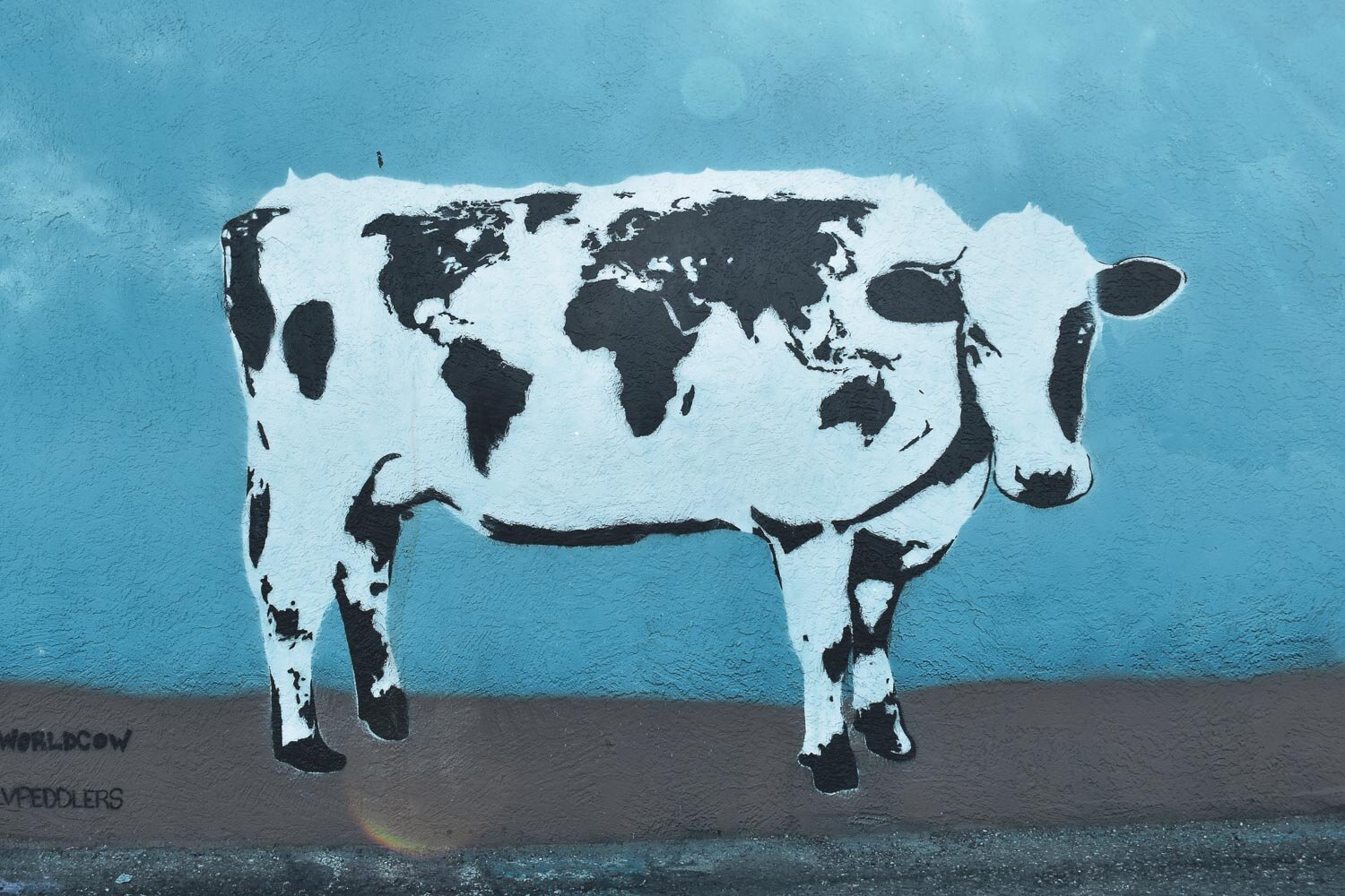 recycled propoganda world cow arts district mural las vegas.jpg