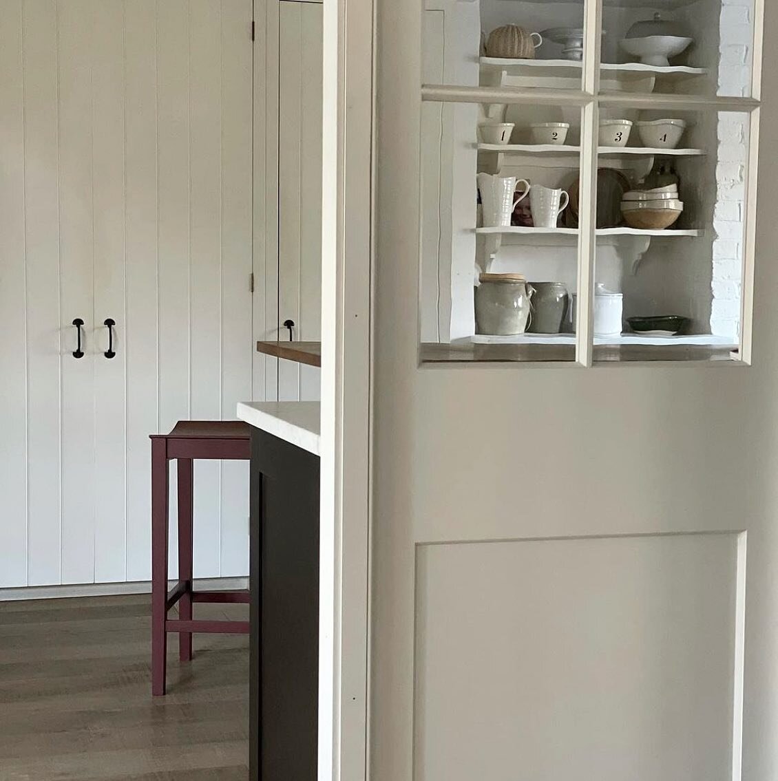 In our kitchen at home, we wanted additional cupboards and worktop space for optimum functionality, but it was important not to shut the space down. A glazed timber partition fit the job perfectly! This approach allows plenty of natural light to stil