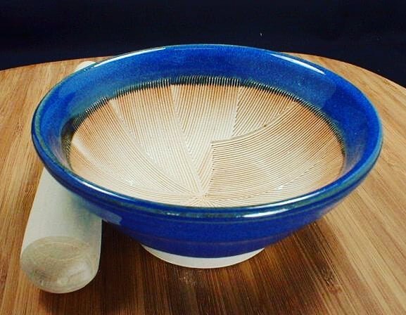 Do you have a suribachi bowl
with a wooden pestle?

A essential tool in the macrobiotic kitchen, for making gomasio, mochi and for make other condiments.