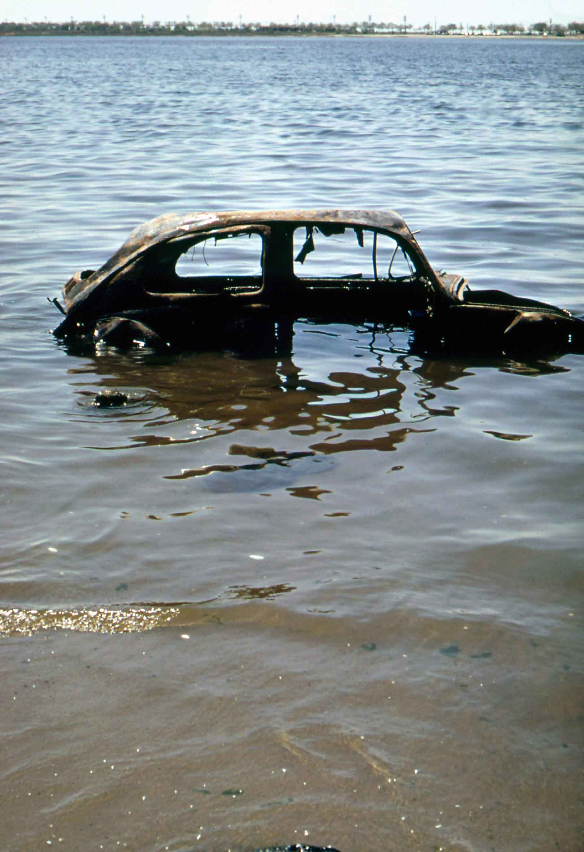 June 1973: Abandoned Car in Jamaica Bay, New York