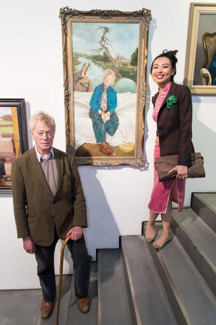 Lantian and Roger Scruton, in front of 'A Portrait of Roger Scruton', at Royal Society of Portrait Painters, London