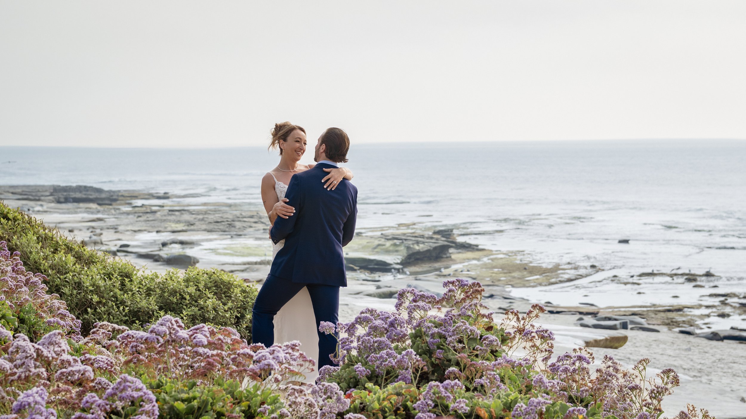 "La Jolla elopement — couple on the bluffs above La Jolla Cove, California"