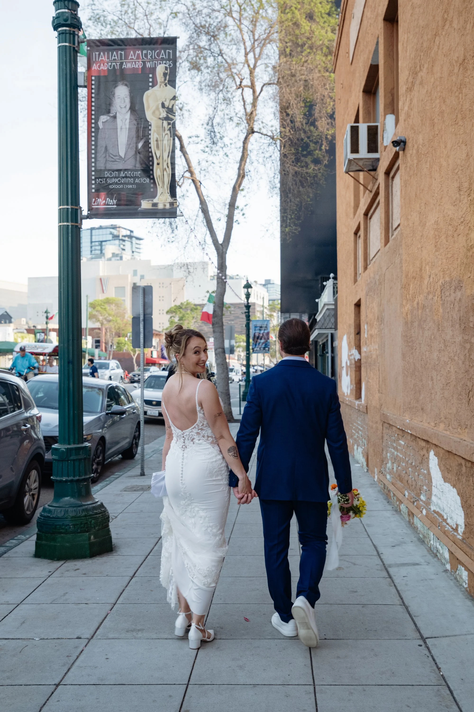Intimate elopement couple portraits in Little Italy San Diego