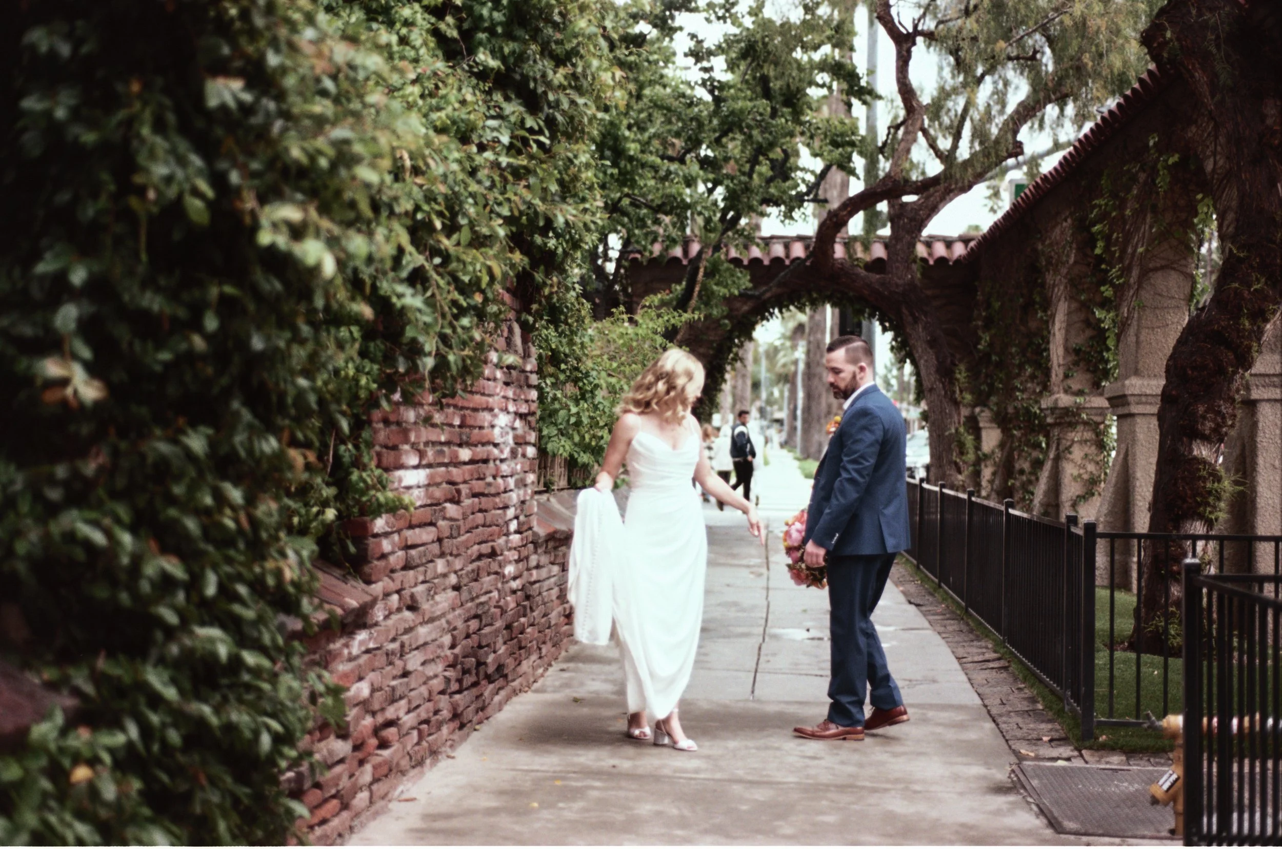 120mm Film -Bride and Groom walking on the pavement