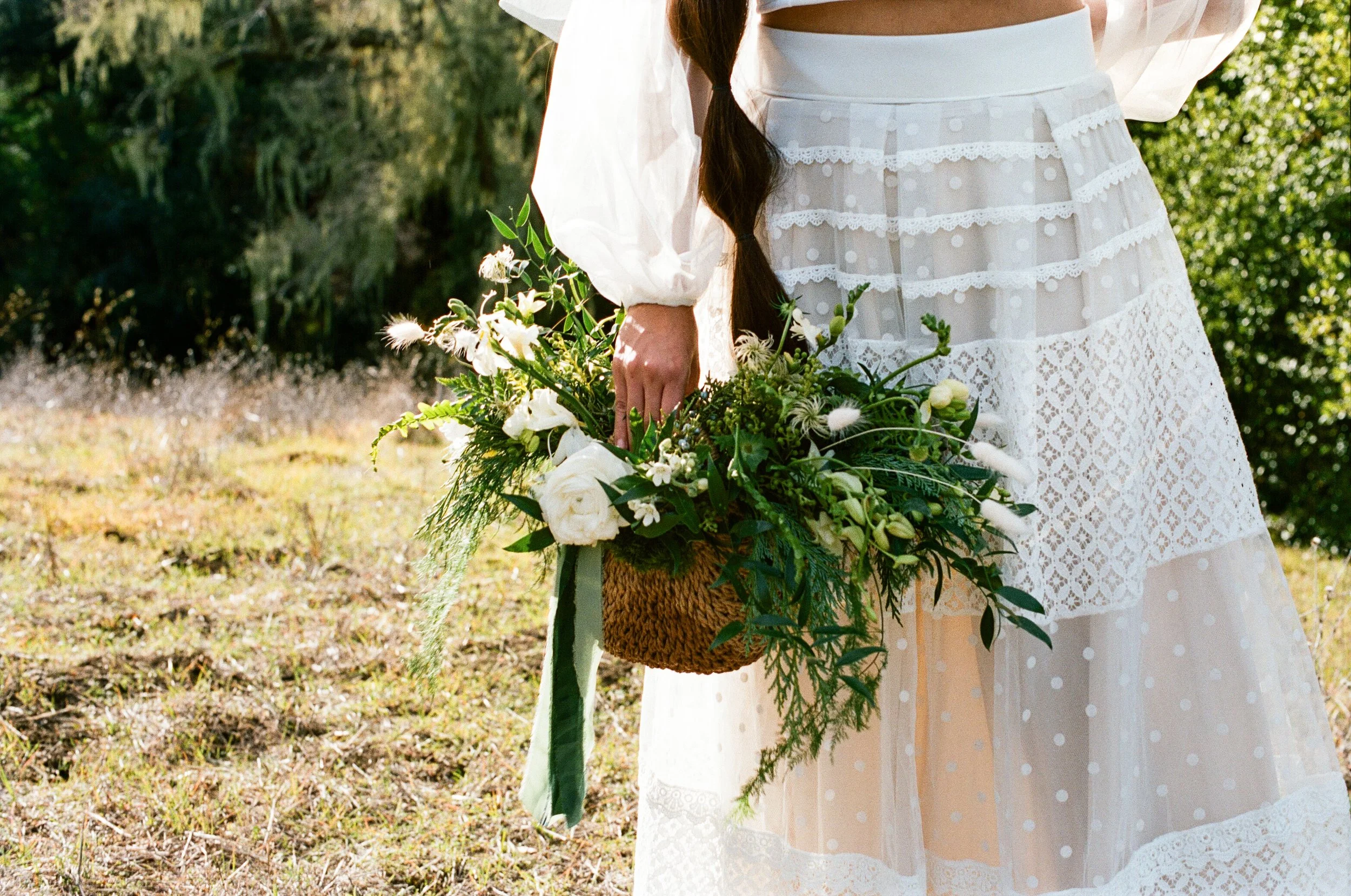 Bride holding her Wedding Bouquet Basket